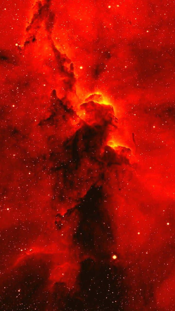 En rød nebulosa i rummet Wallpaper