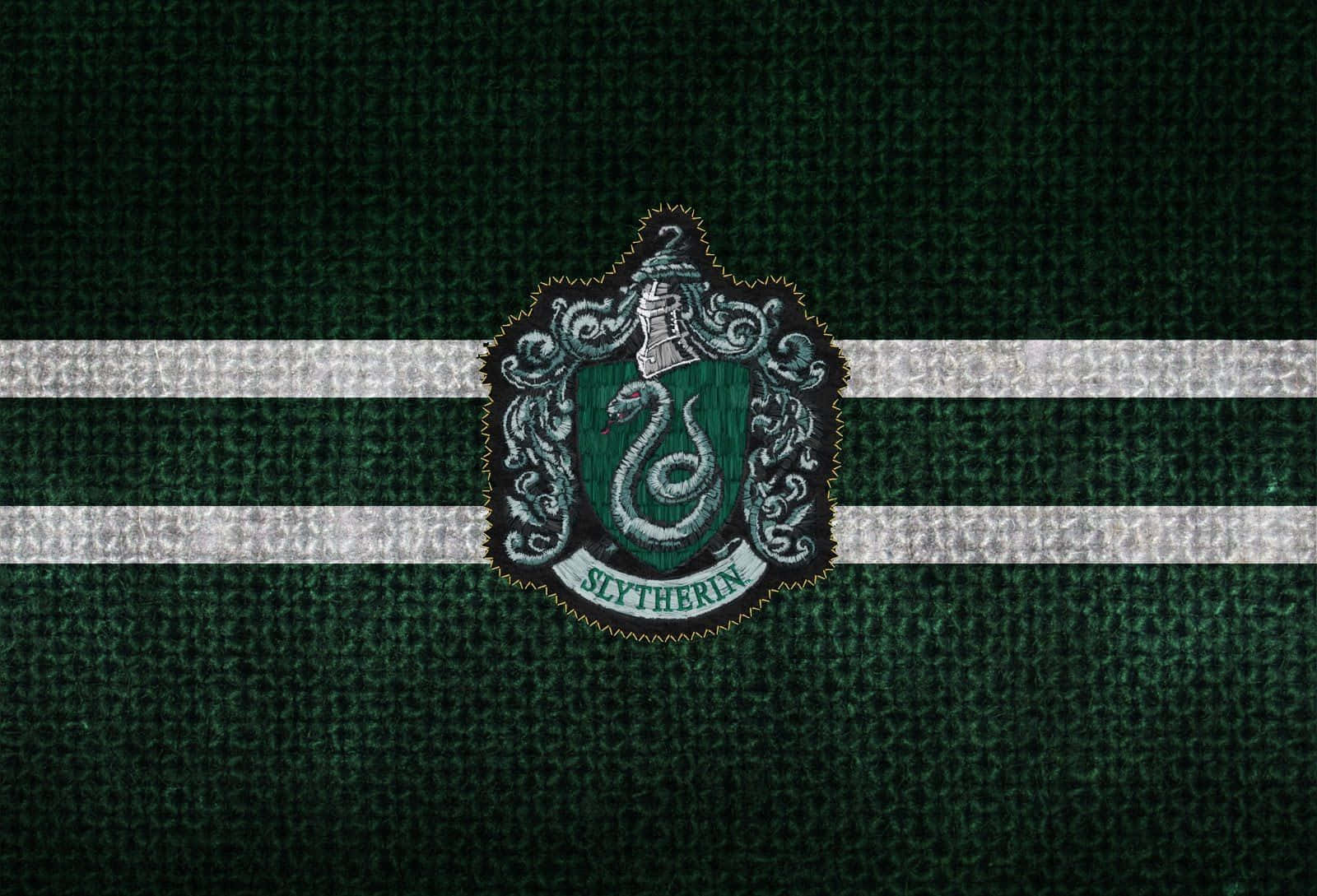 A Slytherin Student Smiles on the Way to Hogwarts Wallpaper