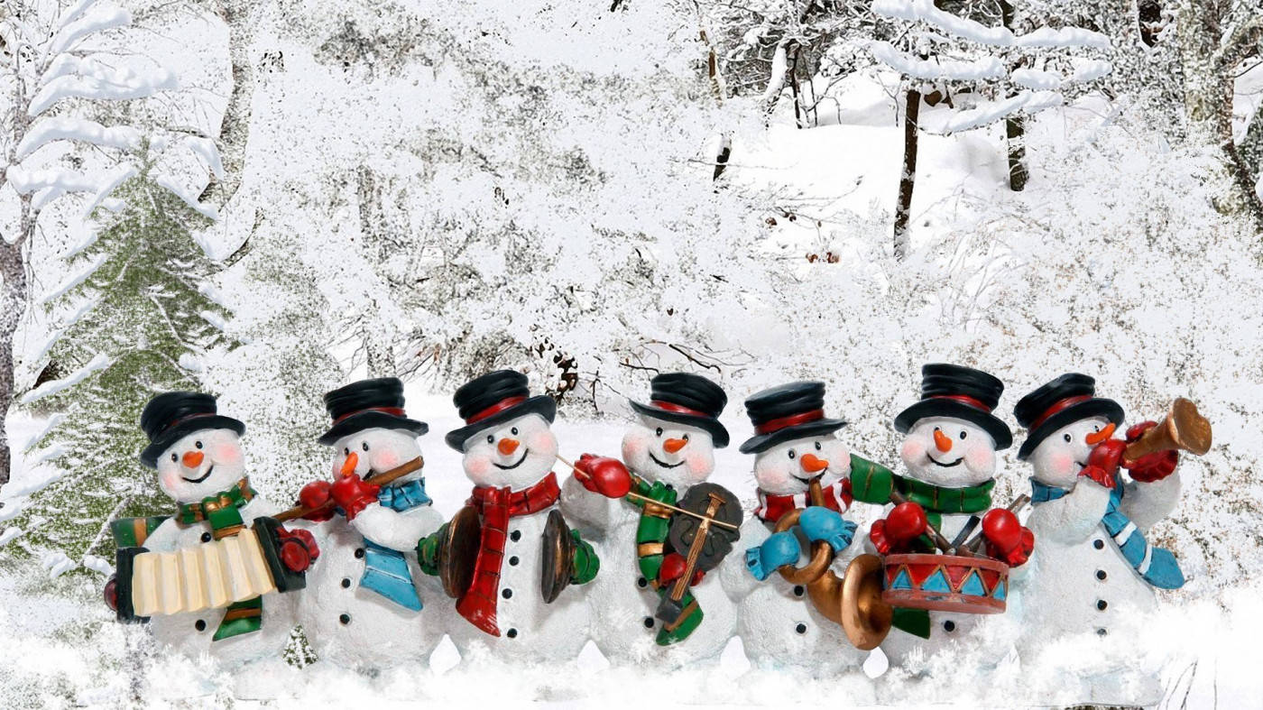 Cute Snow Men With Costumes Wallpaper