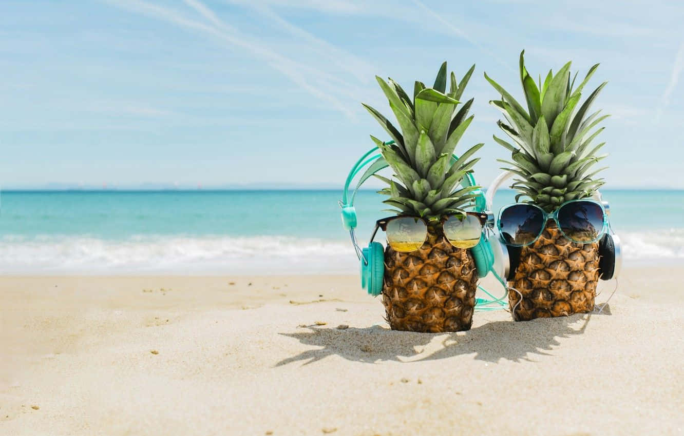 Cute Summer Beach Pineapples With Earphones Wallpaper