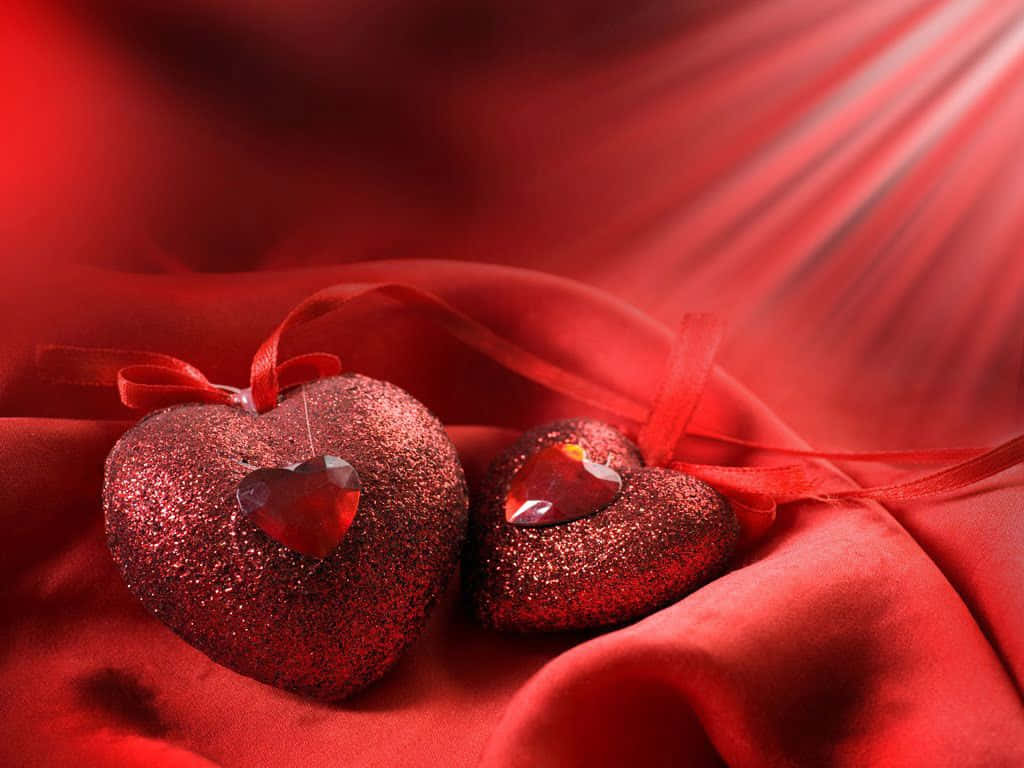Zweirote Herzen Auf Einem Roten Hintergrund Wallpaper