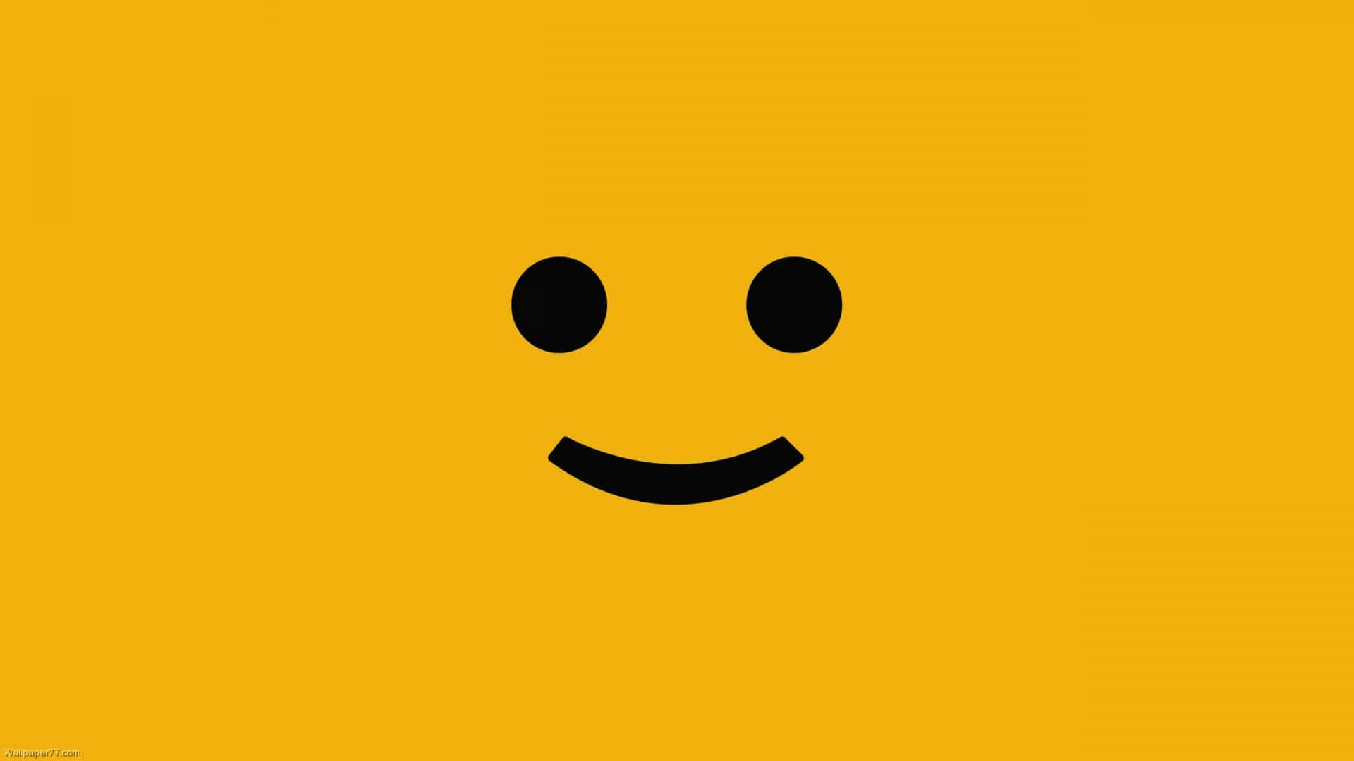 A Yellow Background With A Black Smiley Face