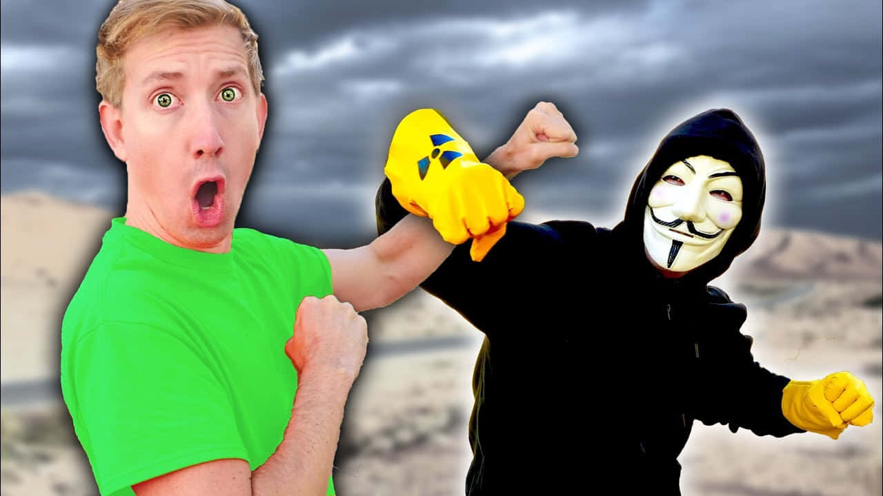 A Man In A Green Shirt And A Man In A Mask Wallpaper