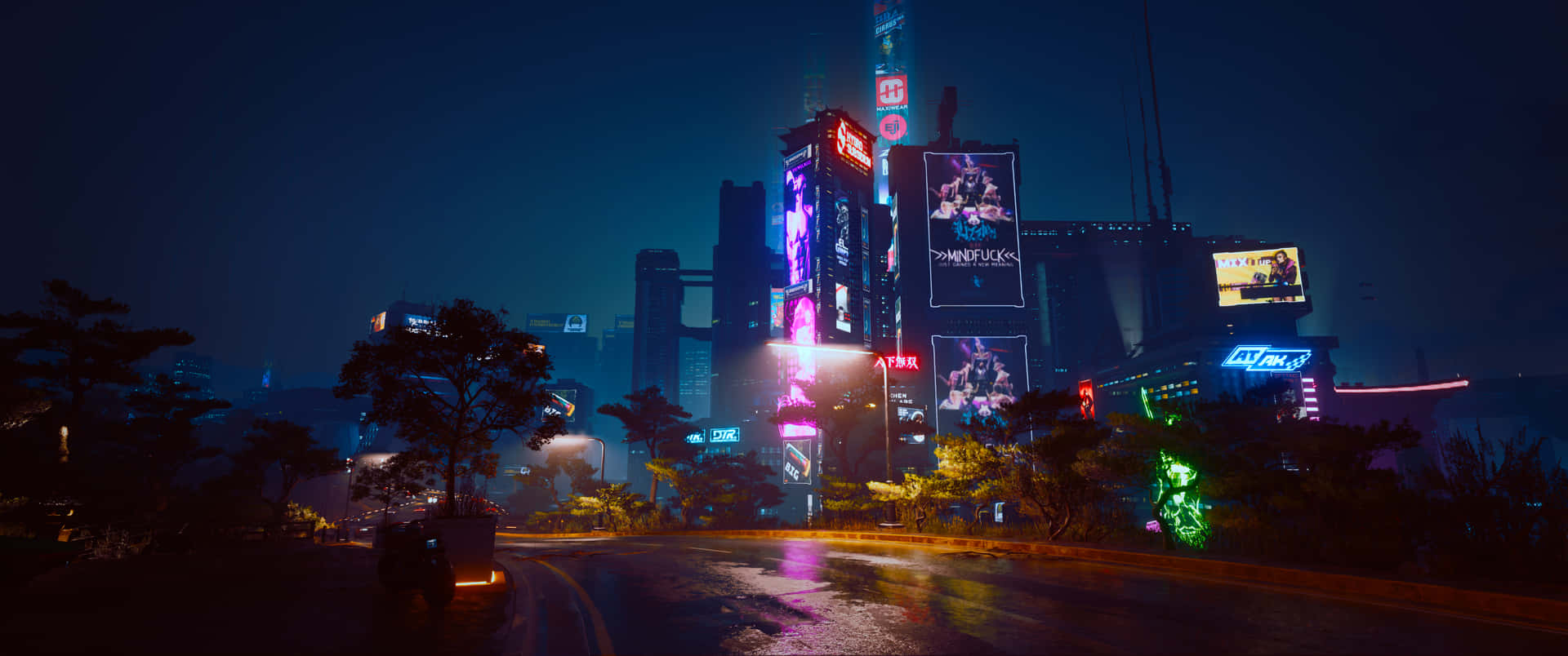 Et cityscape fyldt med neon lys Wallpaper