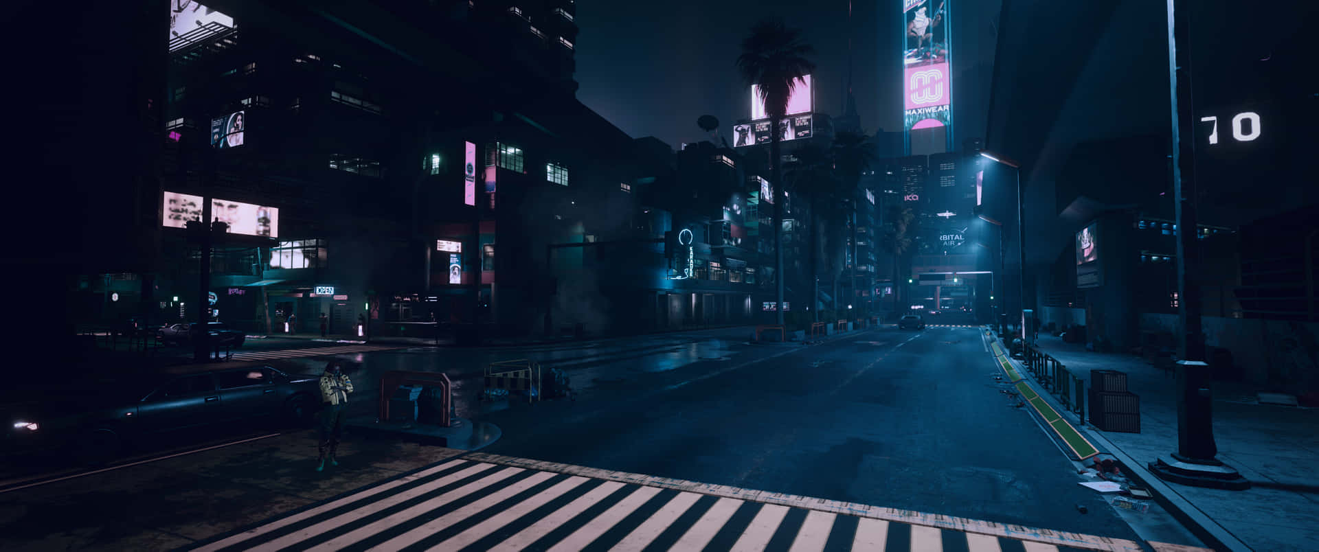 A Dark City Street With Neon Lights And A Crosswalk Wallpaper
