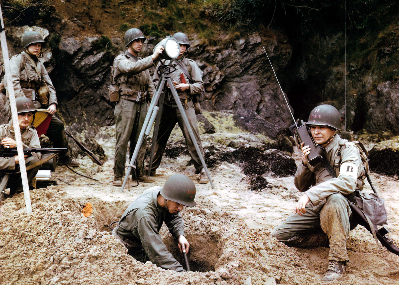 A Group Of Soldiers Are Digging In The Dirt