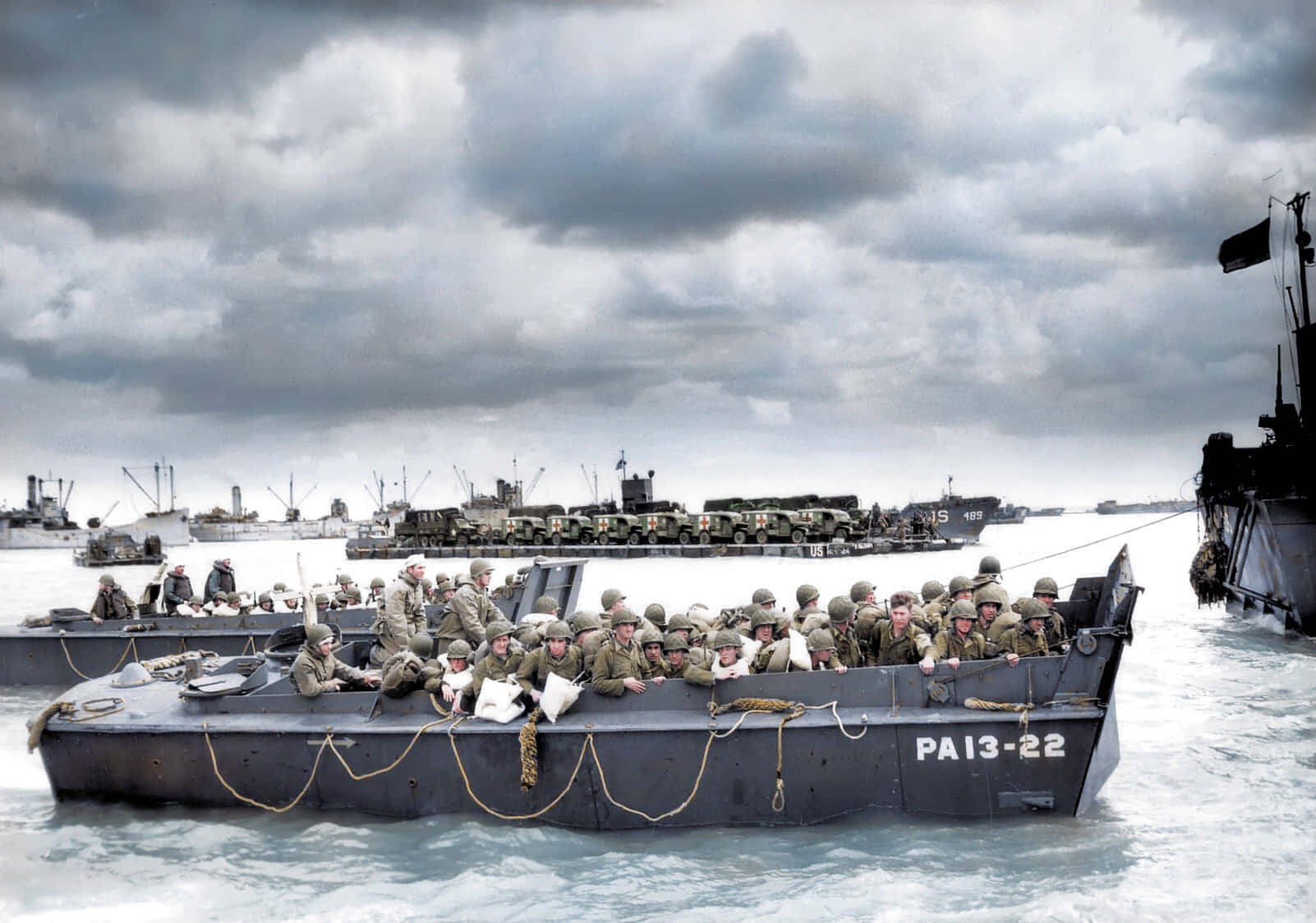 A Group Of Soldiers On Boats In The Water