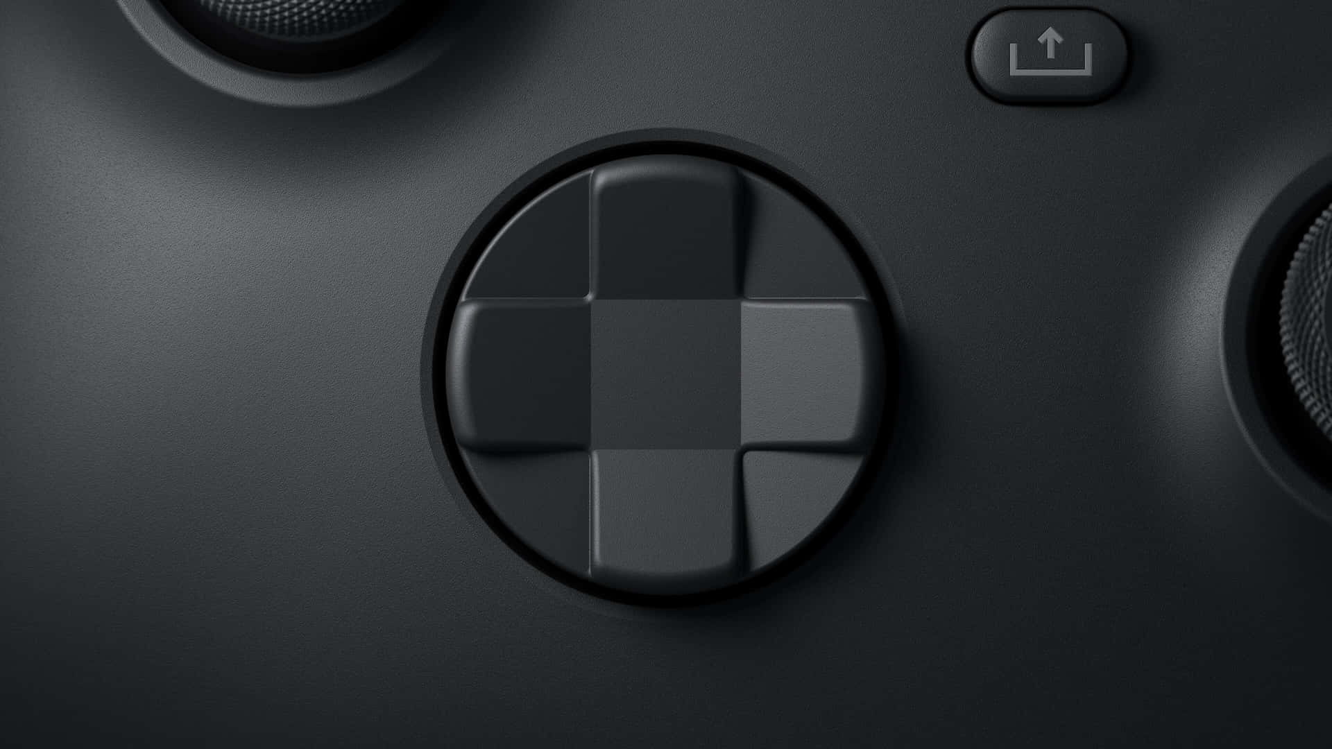 D-pad Of A Remote Game Controller Wallpaper