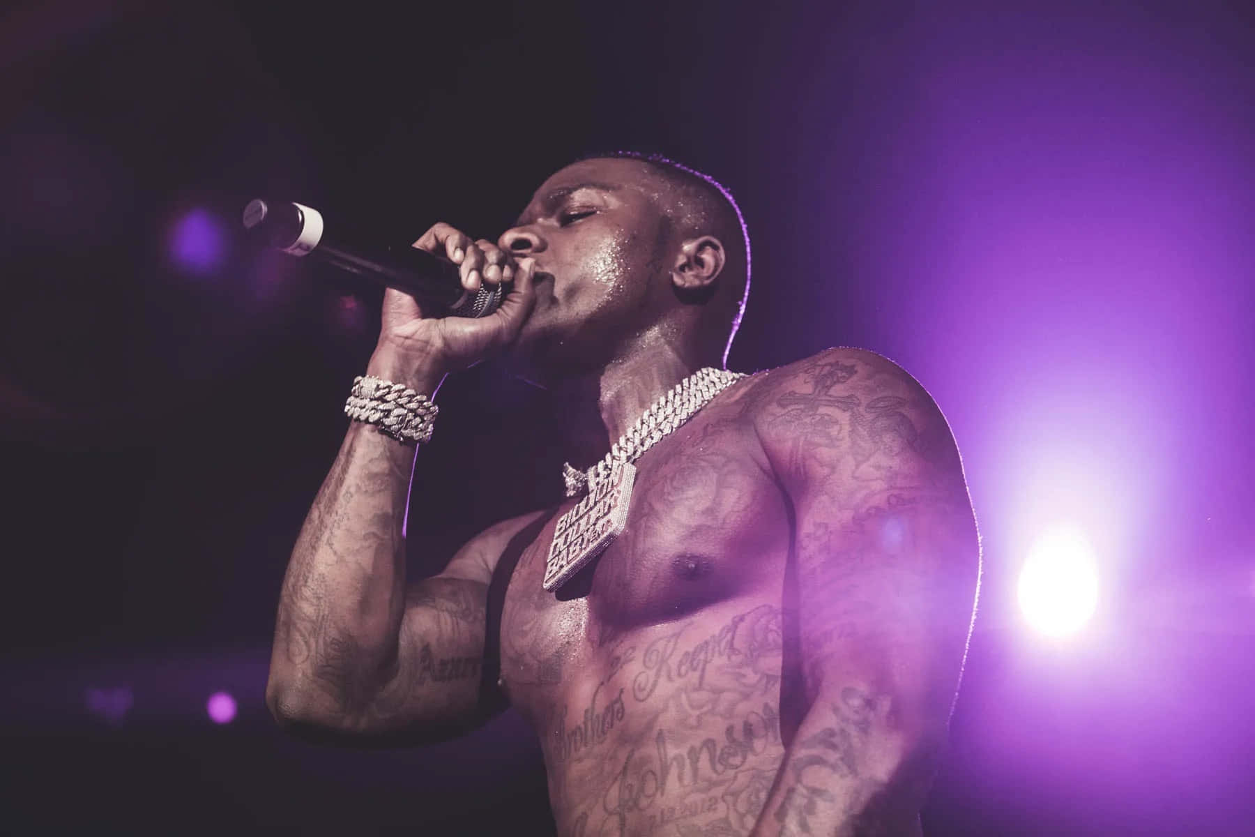 Download DaBaby performing live on stage in a custom outfit