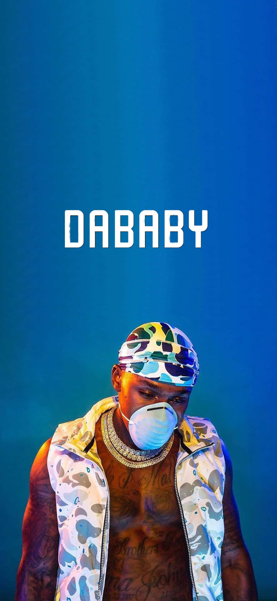 Dababy - A Man In Camouflage With A Bandana On His Head Wallpaper