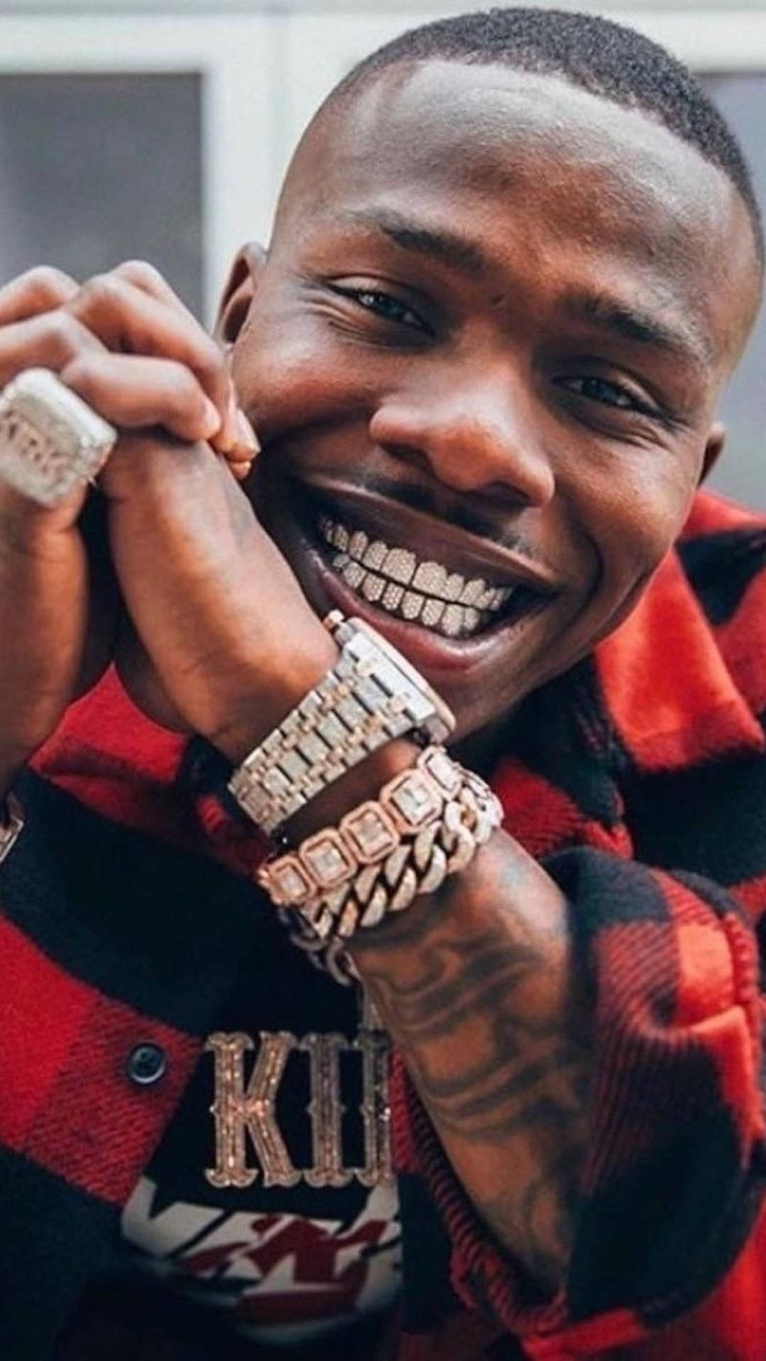 Dababy Phone With Luxurious Accessories Wallpaper