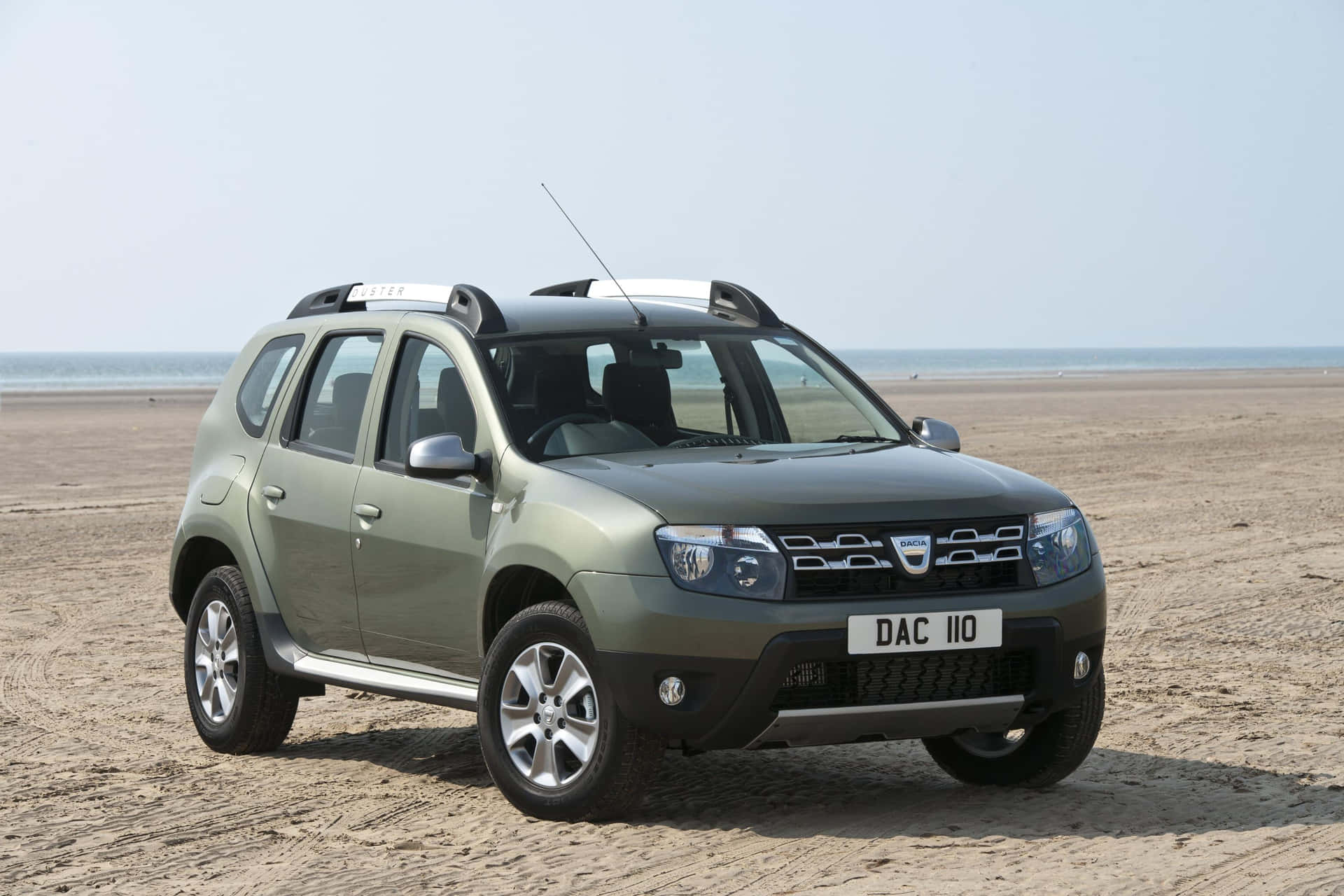 Caption: Dynamic Dacia- The Epitome of Power and Style Wallpaper