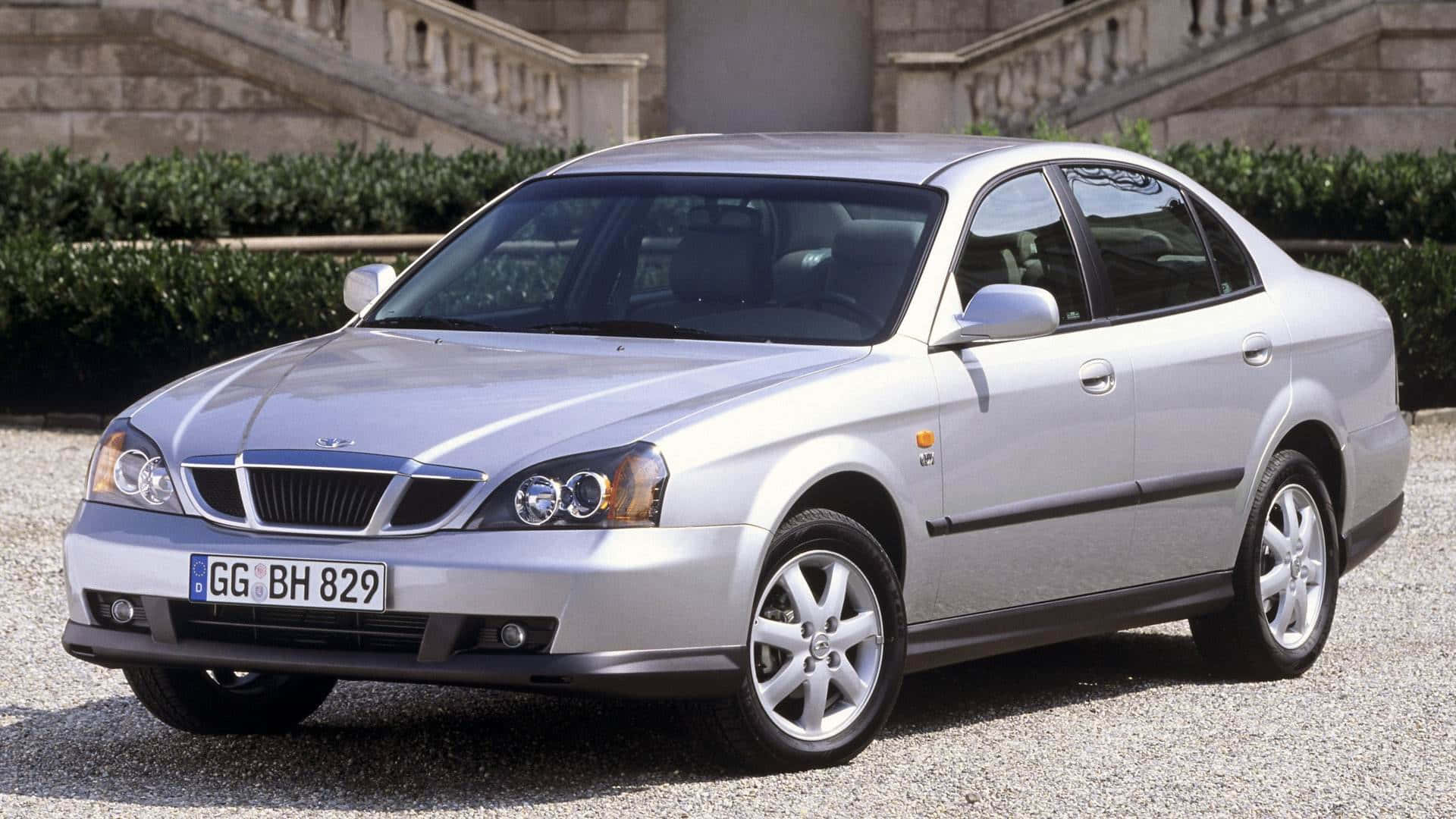 Sleek Silver Daewoo Sedan on a Highway Wallpaper