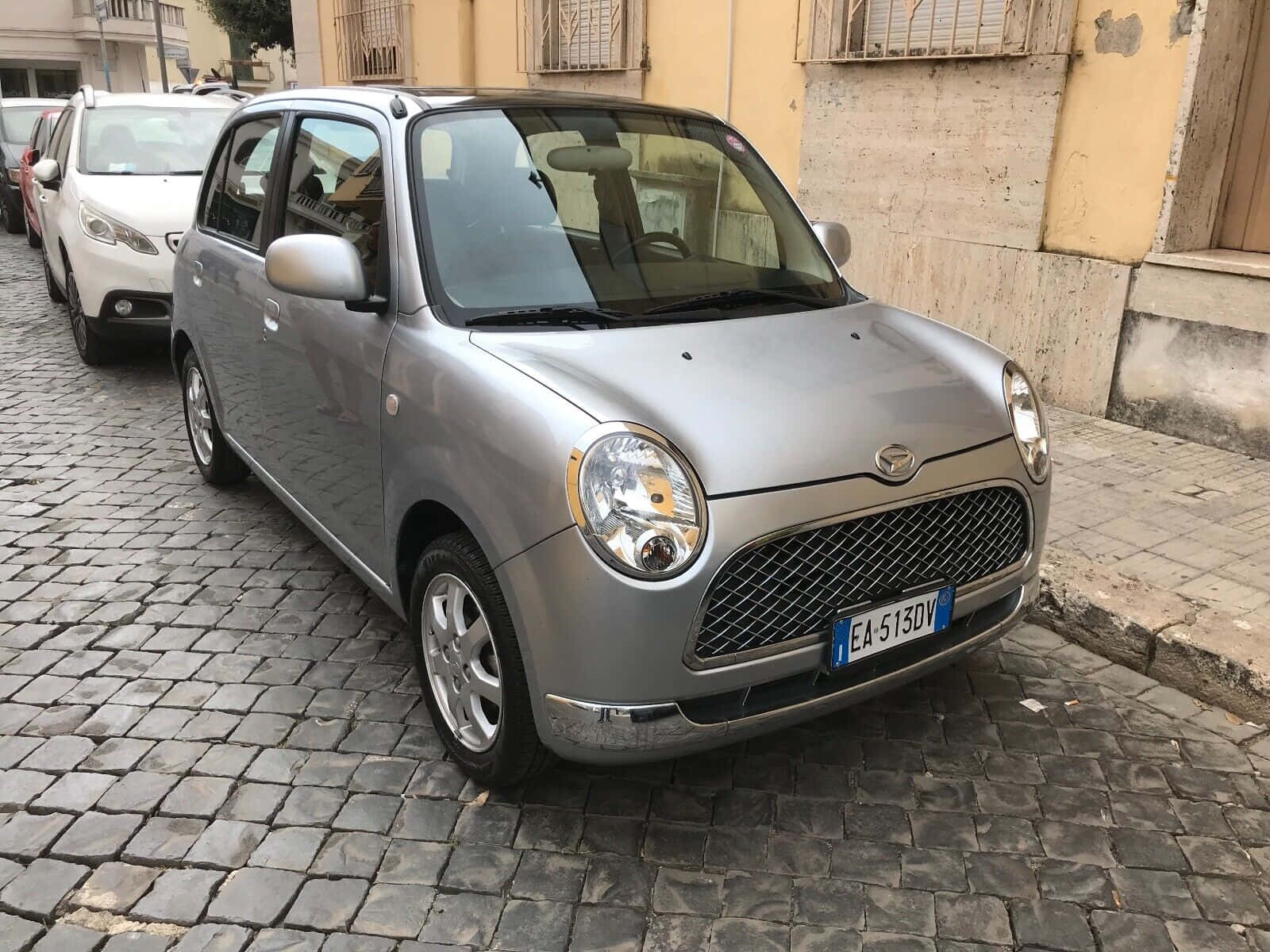 Daihatsu Trevis Parked Beautifully Under Clear Sky Wallpaper