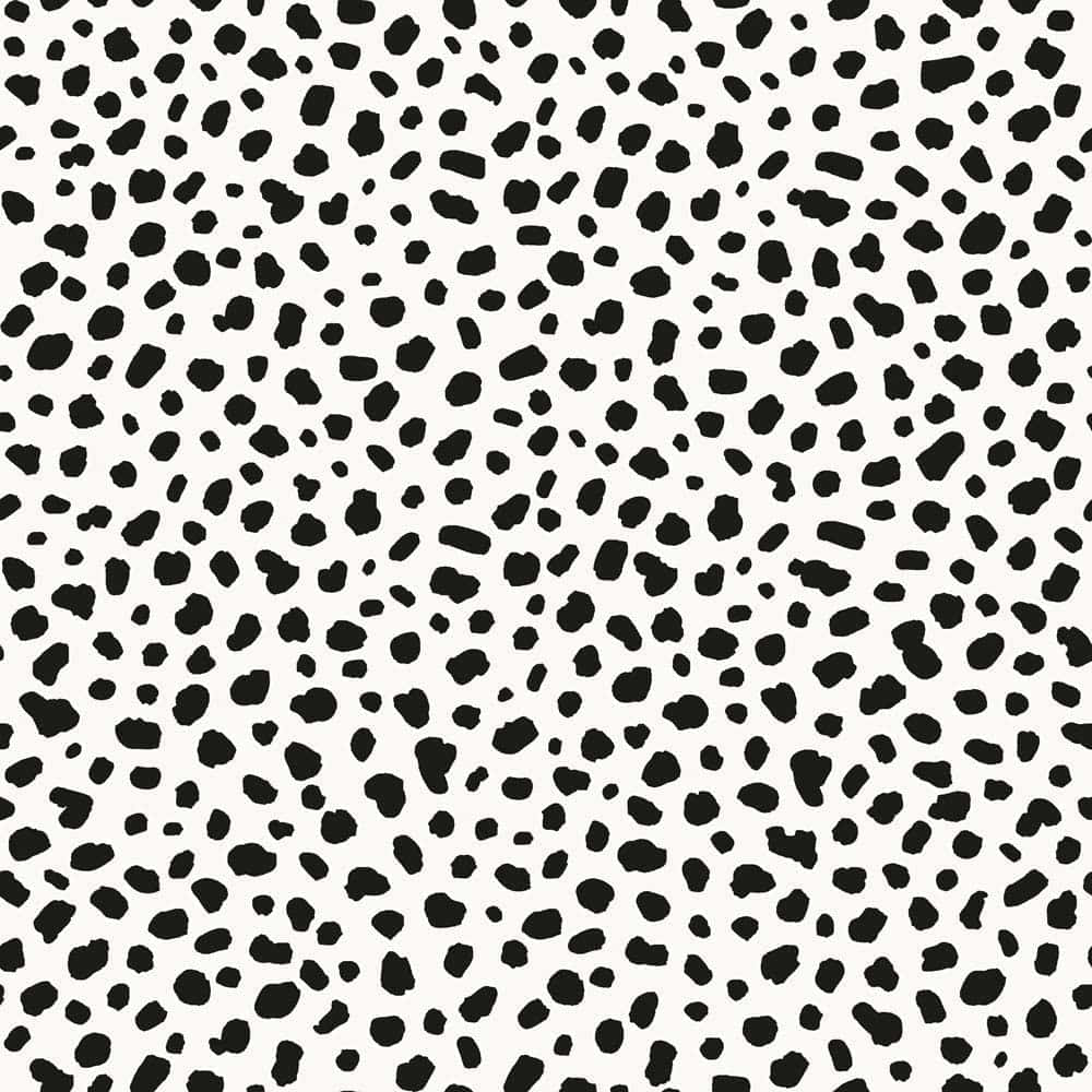Et sort og hvid prikket mønster Wallpaper