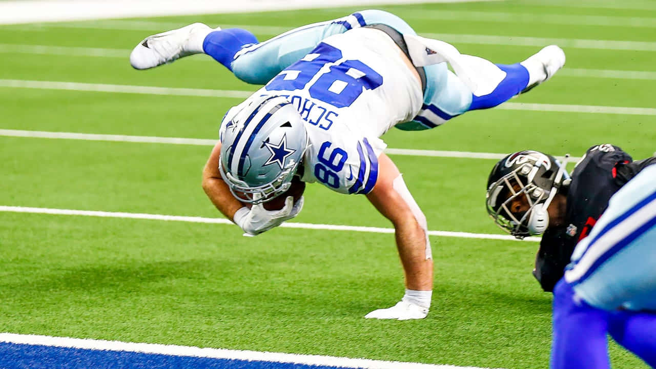 Dalton Schultz Atletische Catch Dallas Cowboys Achtergrond