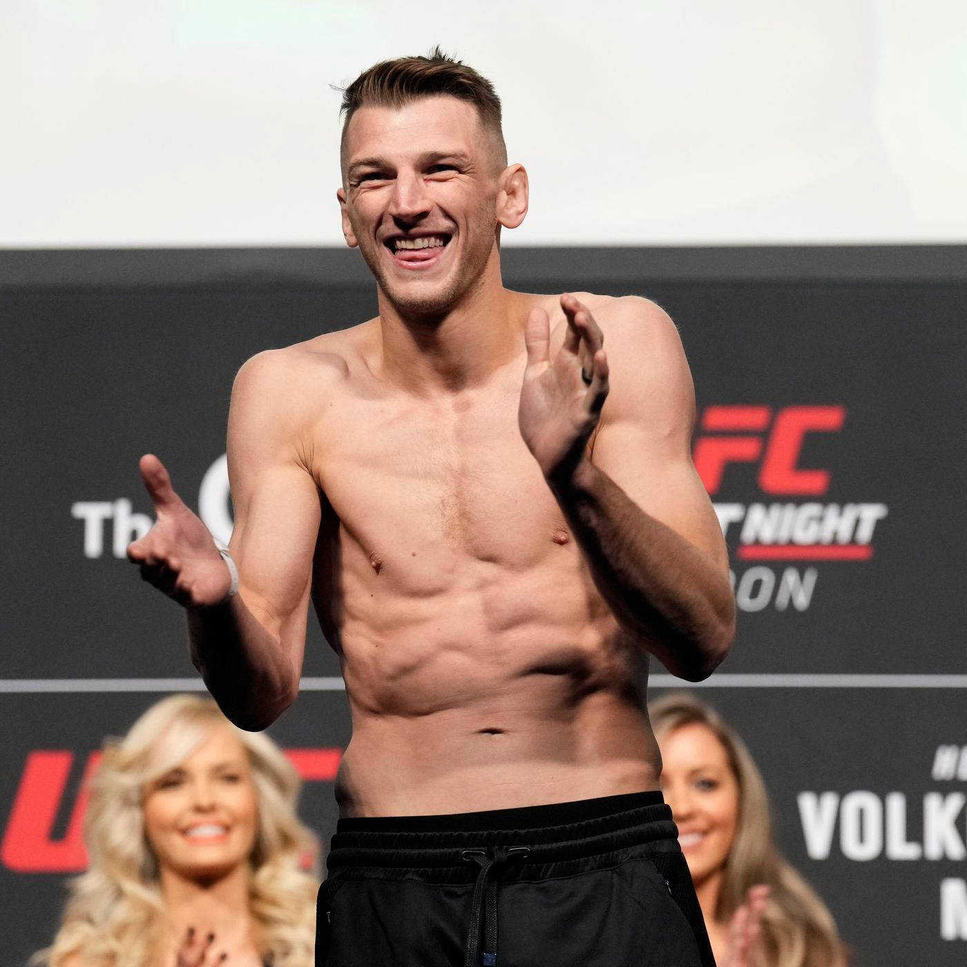 Dan Hooker Clapping While Smiling Wallpaper