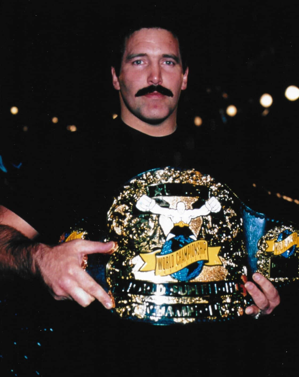 Dan Severn Holding World Champion Belt Wallpaper