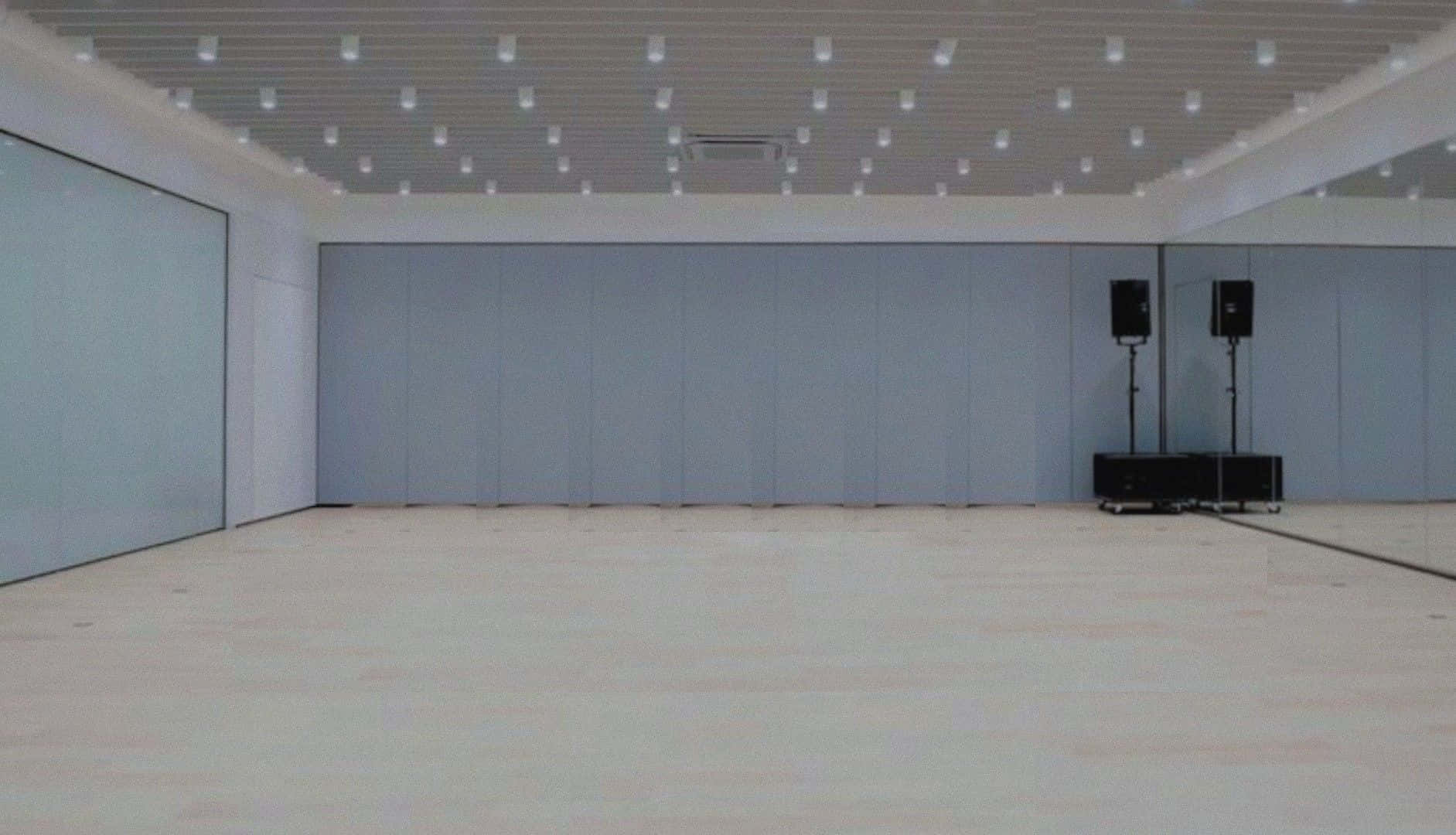 A Large Room With White Walls And A White Ceiling