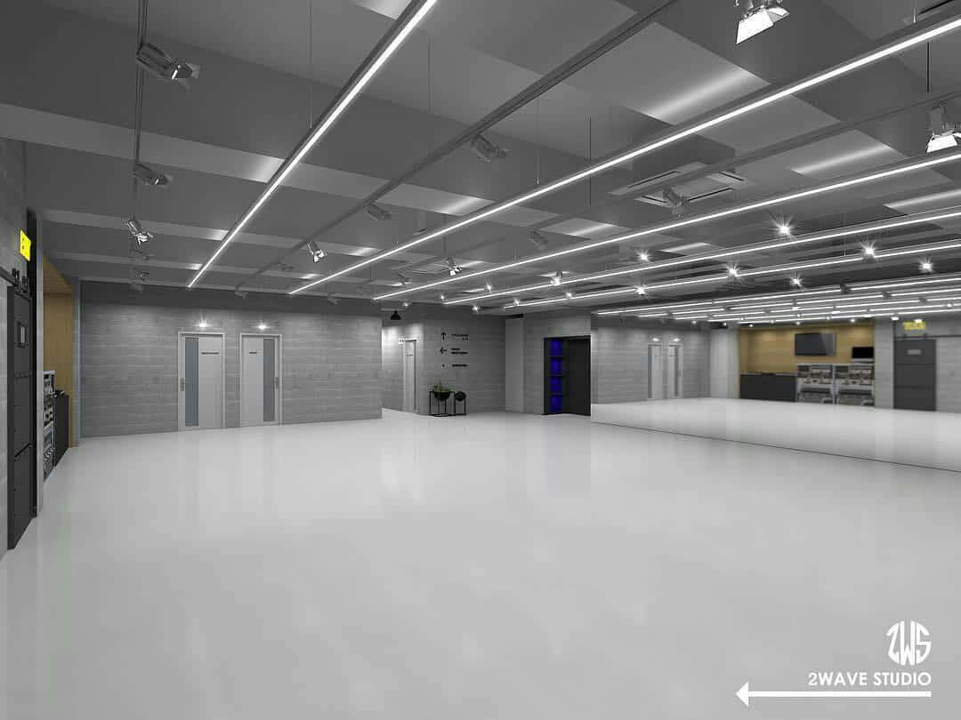 A Rendering Of A Large White Room With Lights