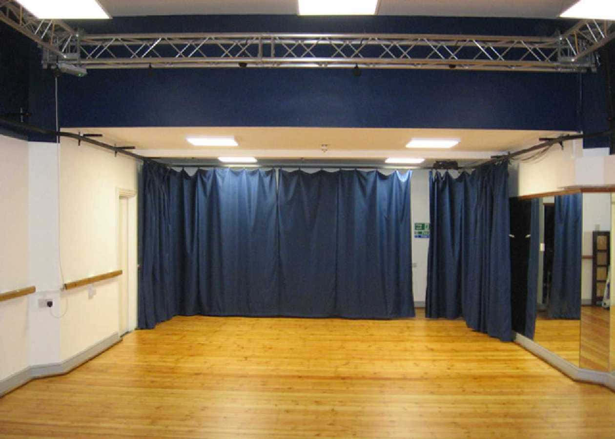 A Room With A Blue Curtain