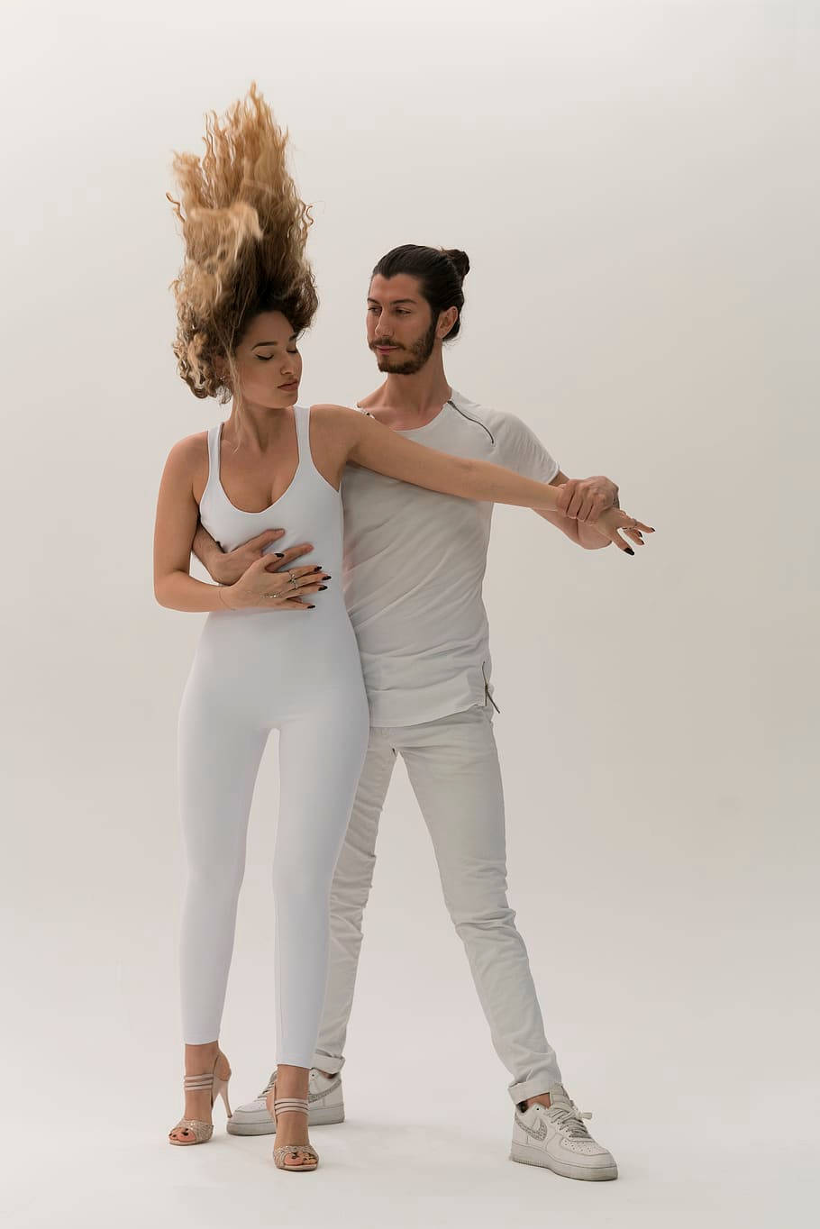 Dancing Couple In White Dance Pose Wallpaper