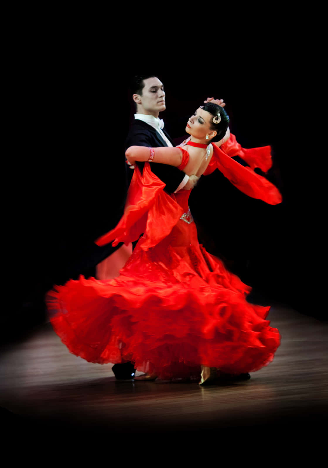 Captivating Rhythm: A Couple's Passionate Dance Moment