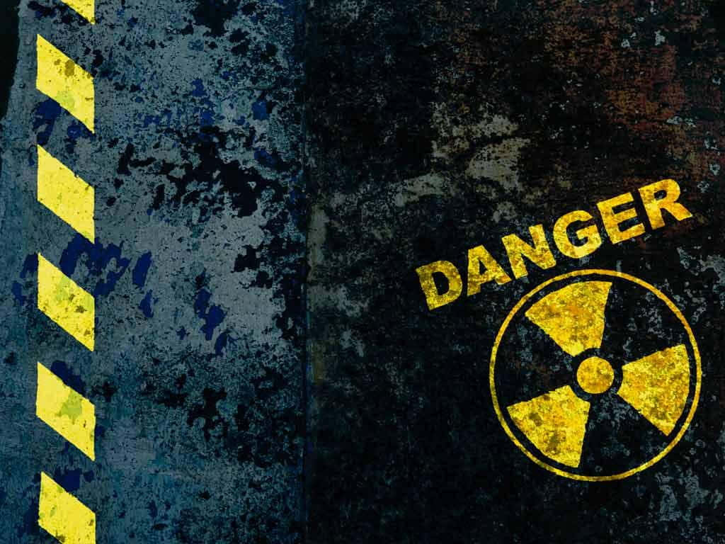A Radioactive Sign On A Rusty Background