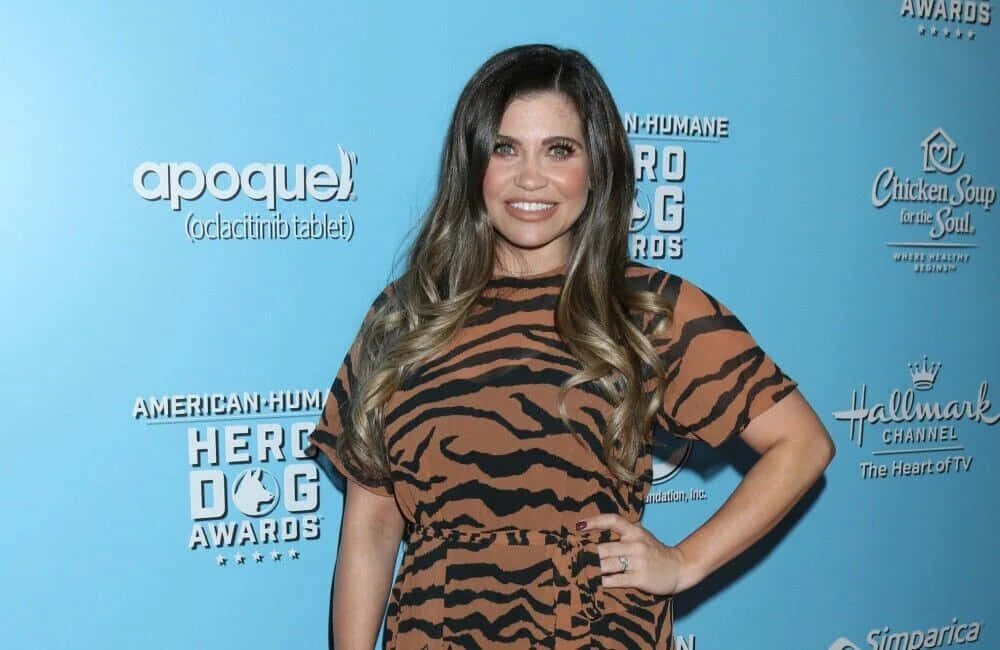 Danielle Fishel Tijdens Een Fotoshoot Achtergrond