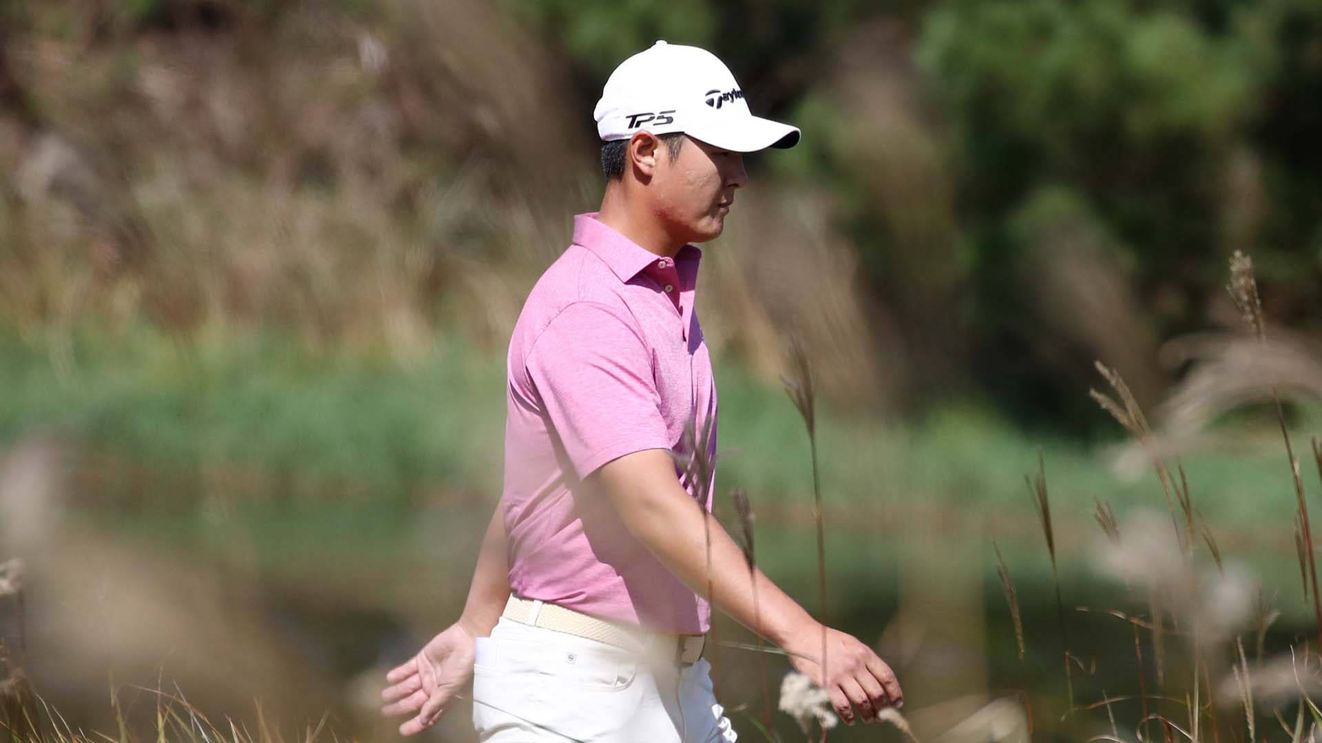 Danny Lee In Pink And White Attire Wallpaper