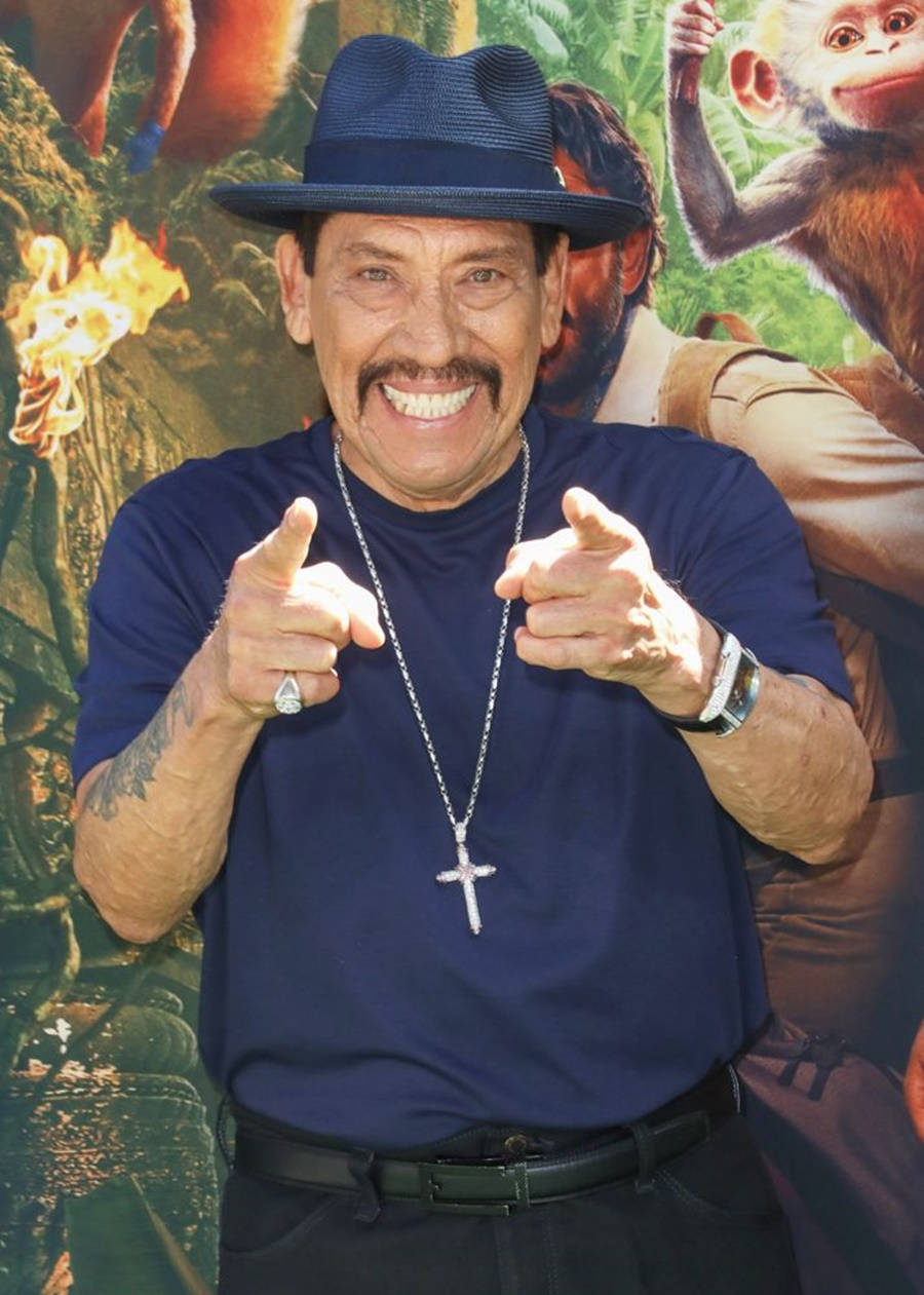 Enthusiastic Danny Trejo Pointing at the Camera Wallpaper