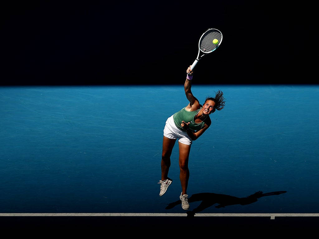 Professional Tennis Player Daria Kasatkina in Action Wallpaper