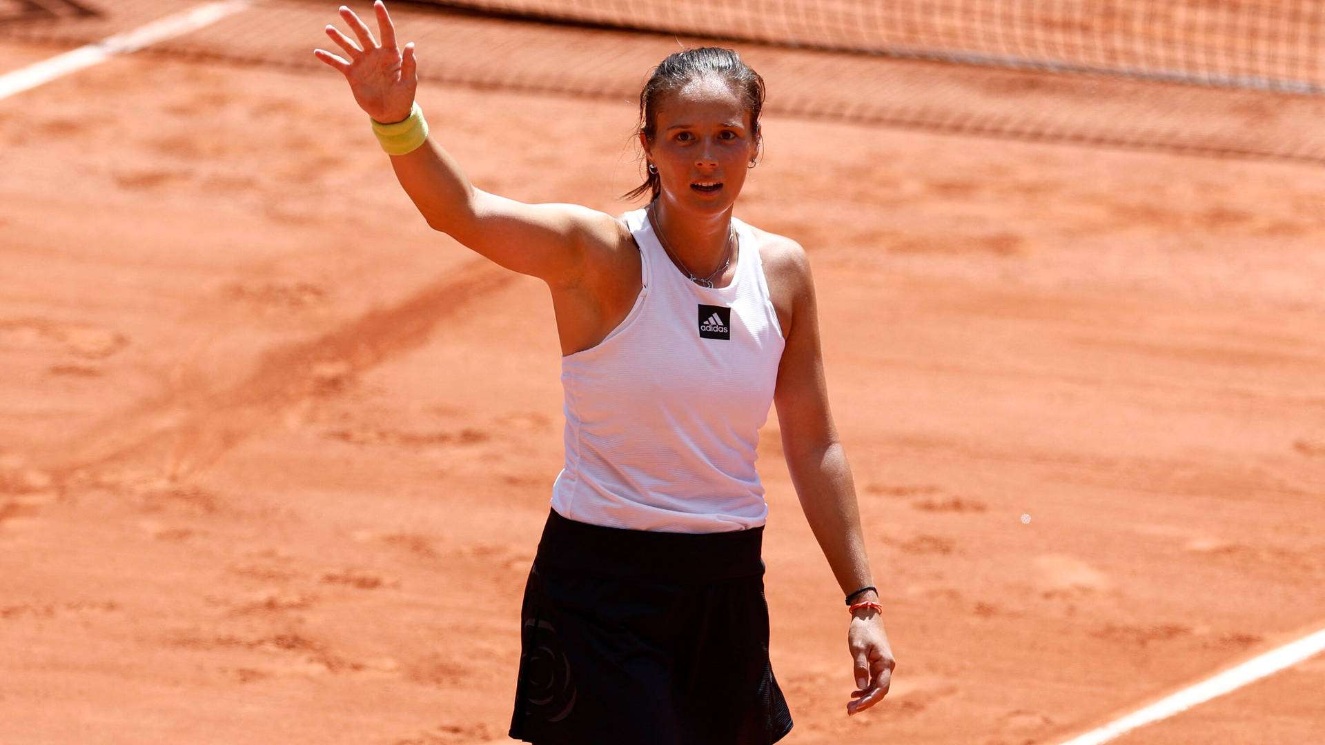 Daria Kasatkina Celebrates Victory on Tennis Court Wallpaper