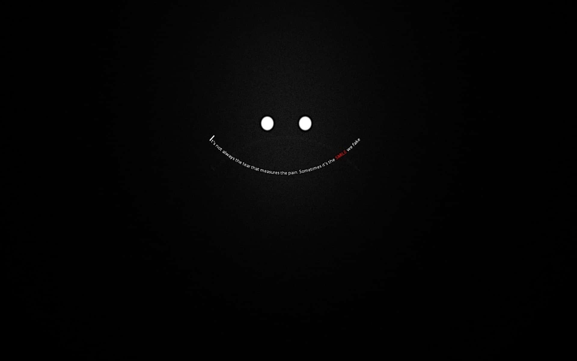 a black background with a smiling face