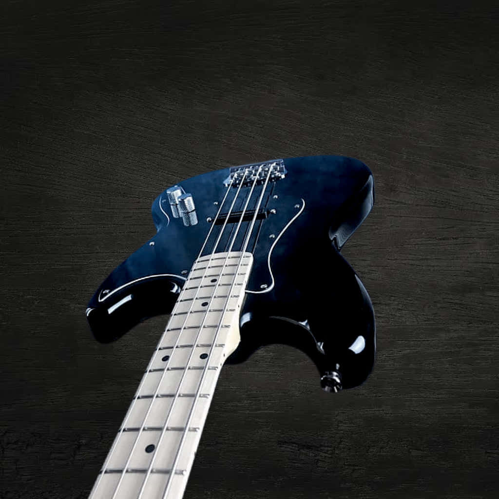 Dark Blue Bass Guitaron Wooden Background Wallpaper