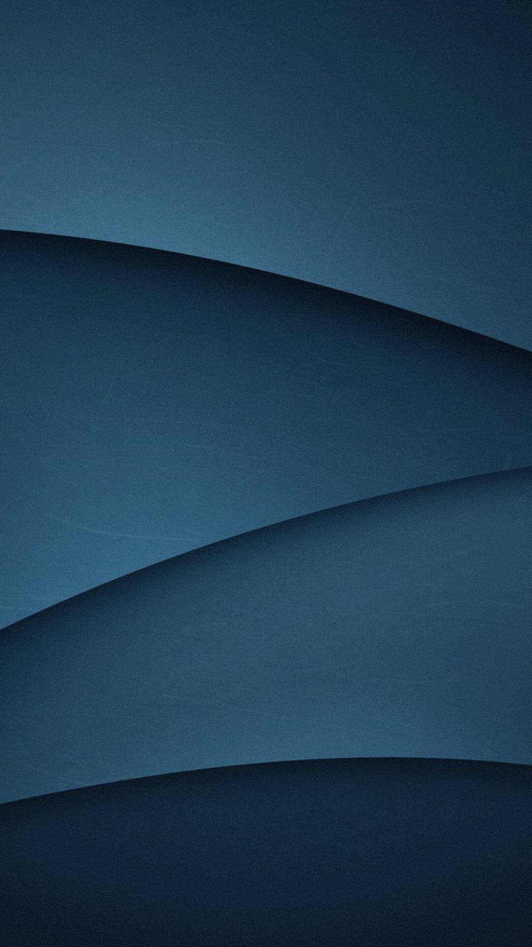 En blå baggrund med et bølget formdesign Wallpaper