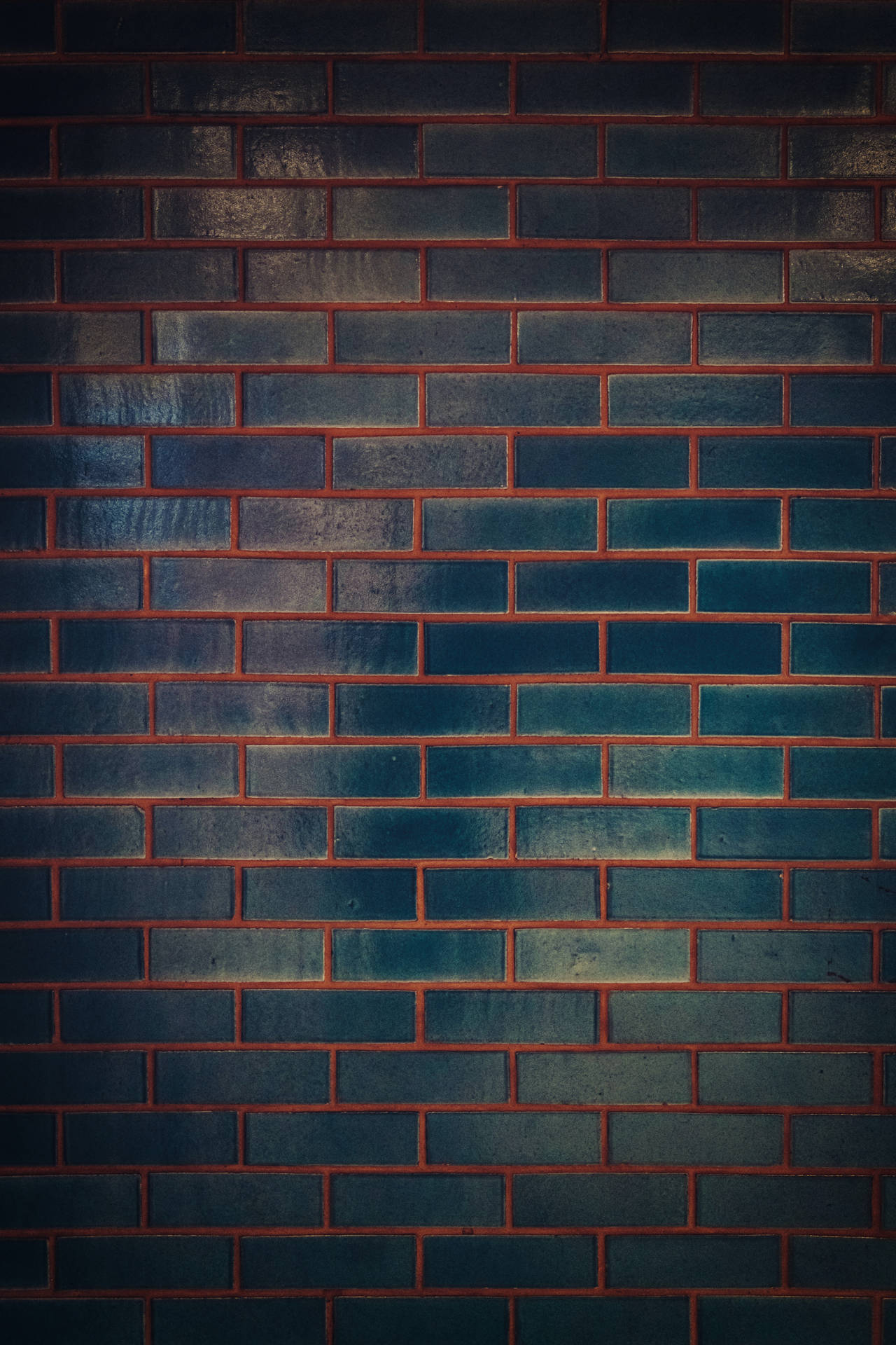 Caption: Striking Texture of a Dark Brick Wall Wallpaper