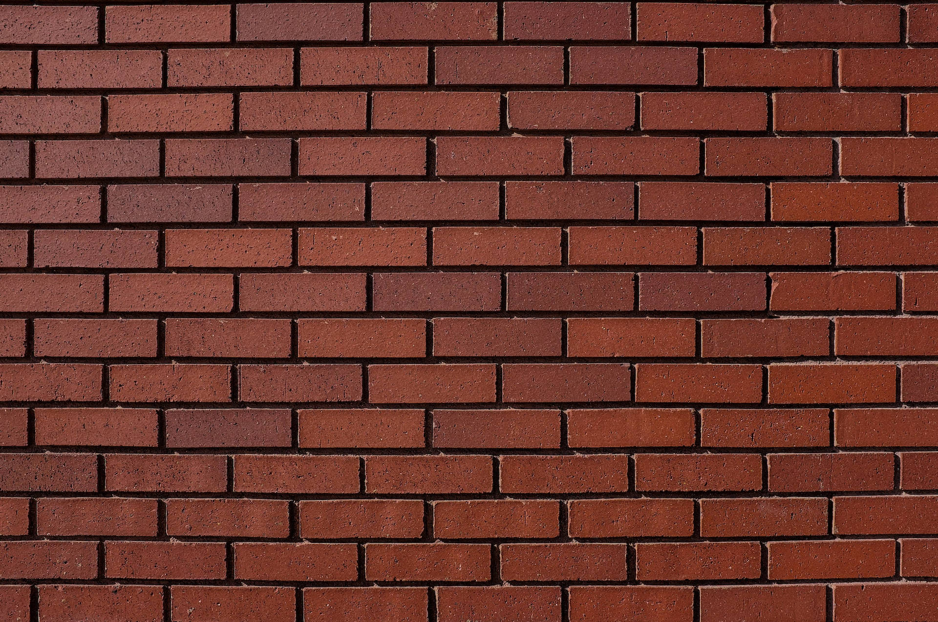 Dark Brown Running Brick Wall Background