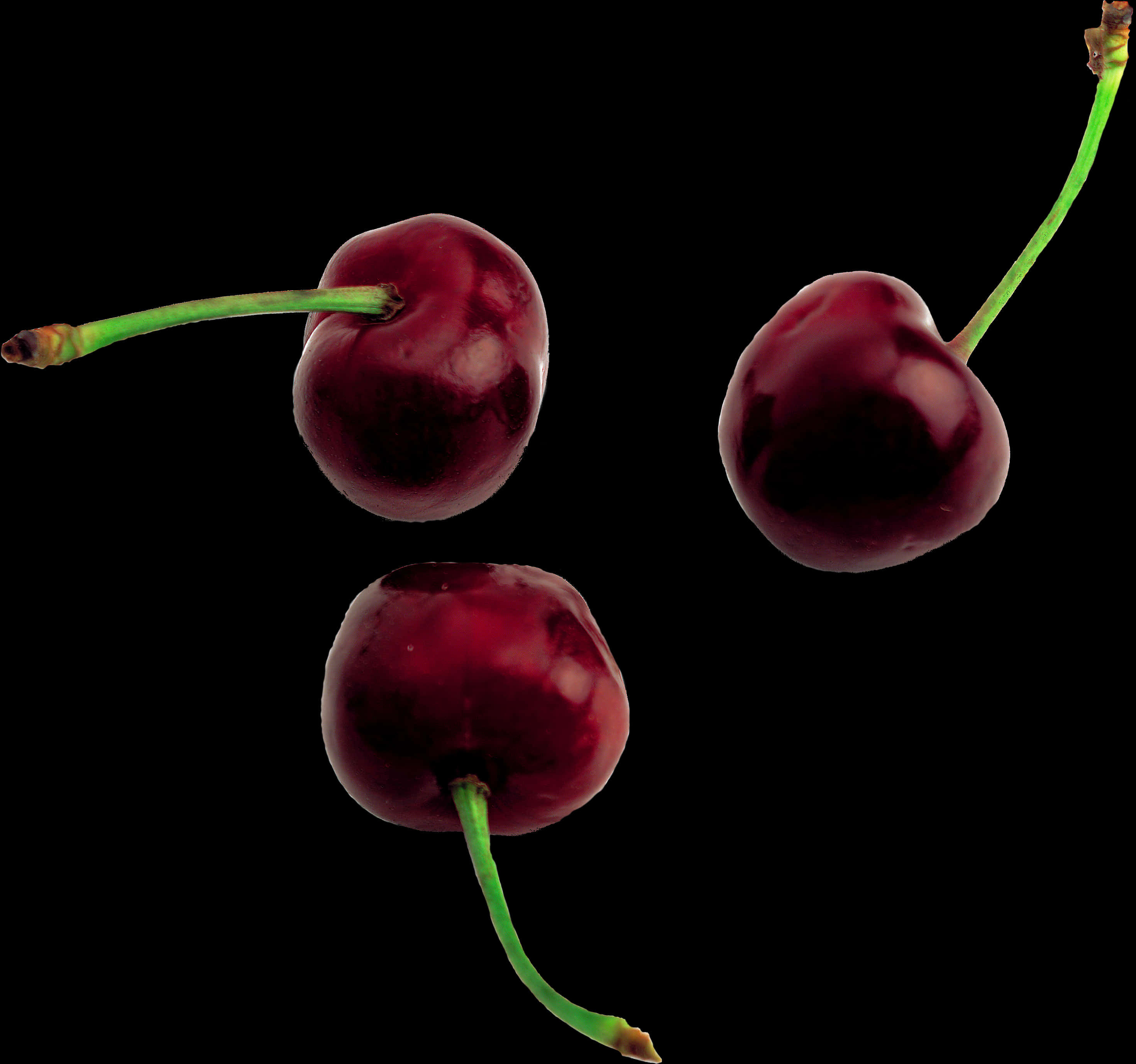 Dark Cherries Against Black Background PNG