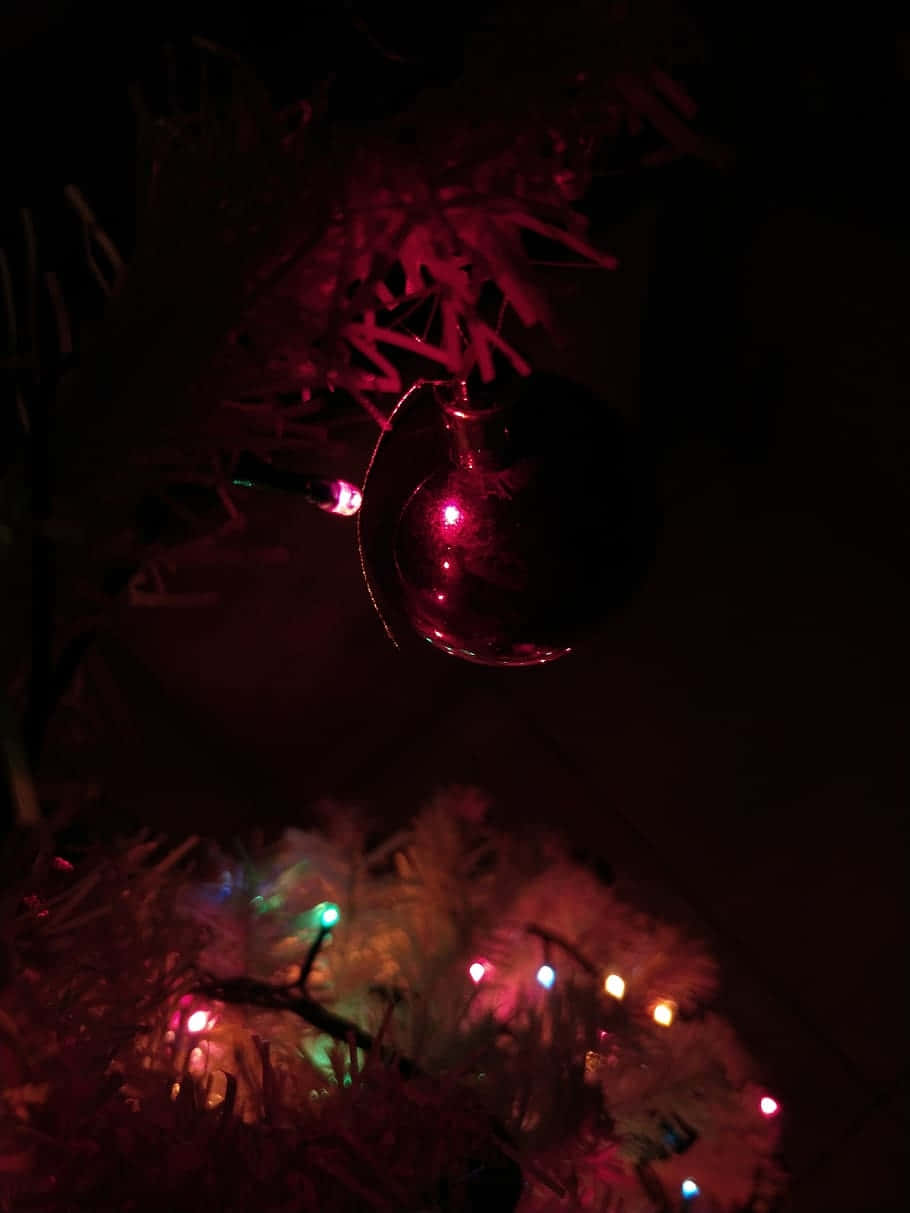 Dark Christmas Ornamentand Lights Wallpaper