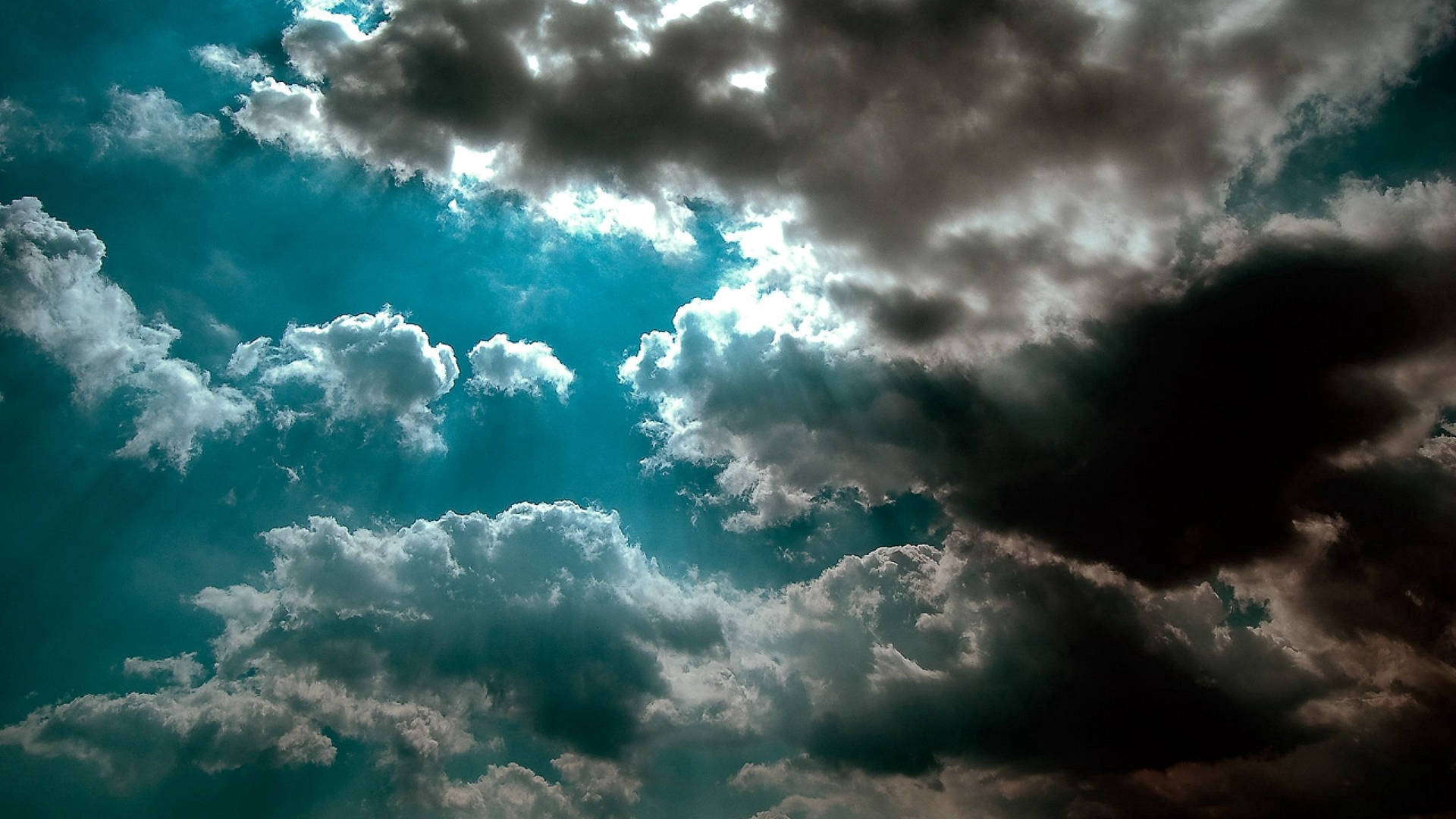 Dark Clouds In Azure Sky Wallpaper