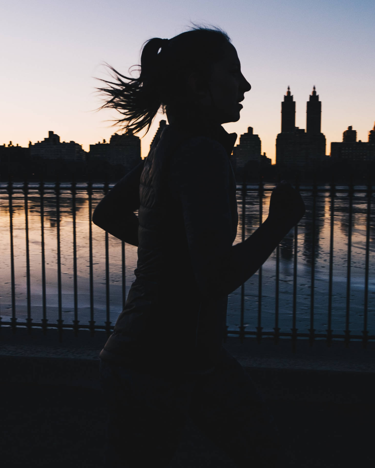Dark Girl Jogging In City Wallpaper