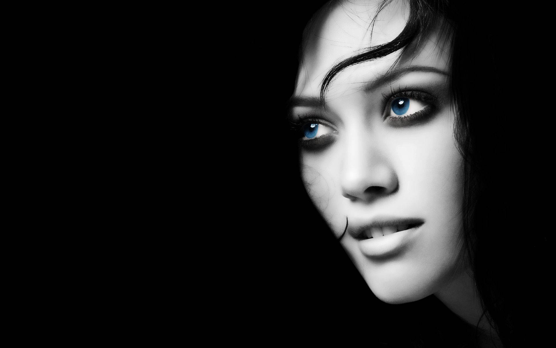 Dark Girl Looking With Blue Eyes Background
