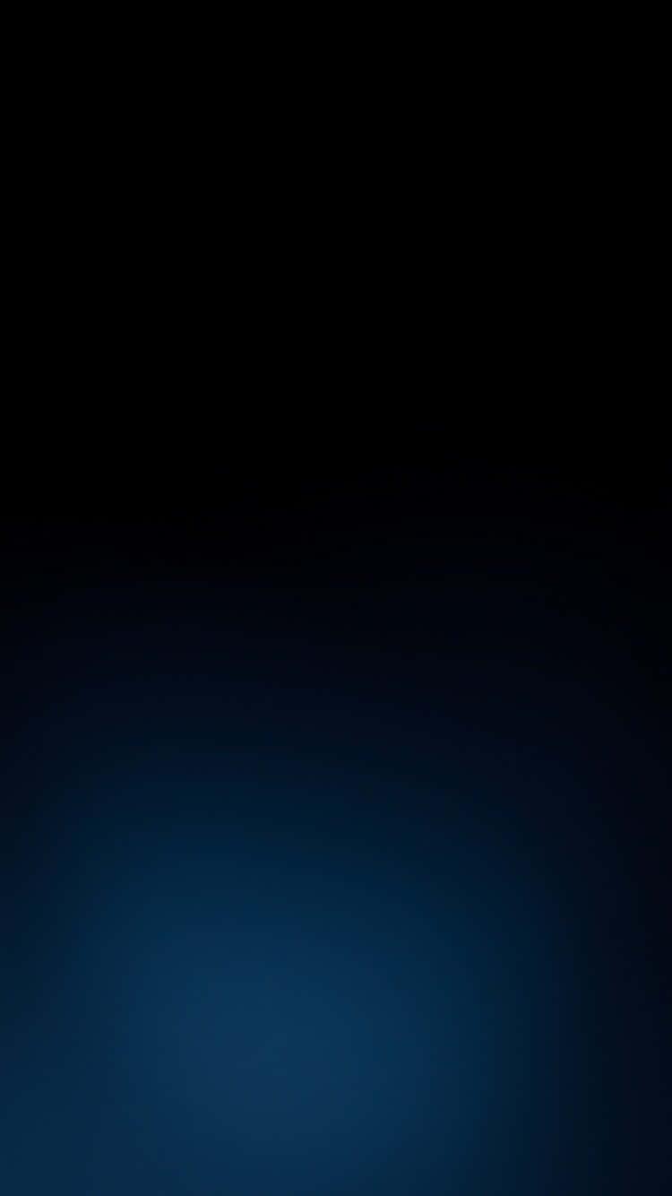 A Blue Background With A Light Shining On It Wallpaper