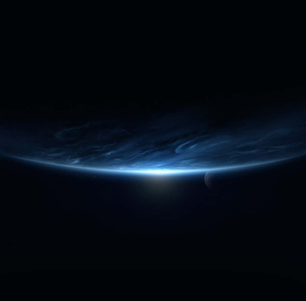 Unfondo De Espacio Azul Con Un Planeta Azul Fondo de pantalla