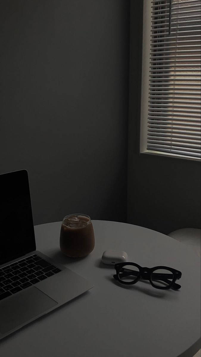 Dark Iphone Desk With Glasses Wallpaper