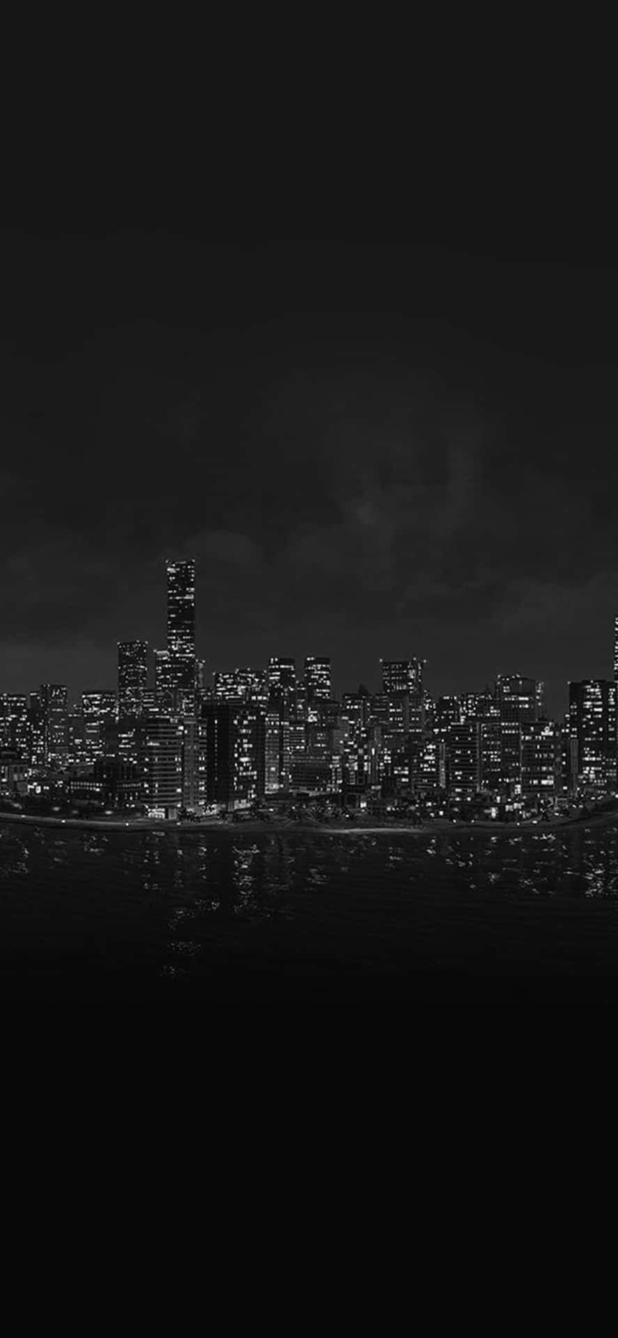 A Black And White Image Of A City Skyline Wallpaper