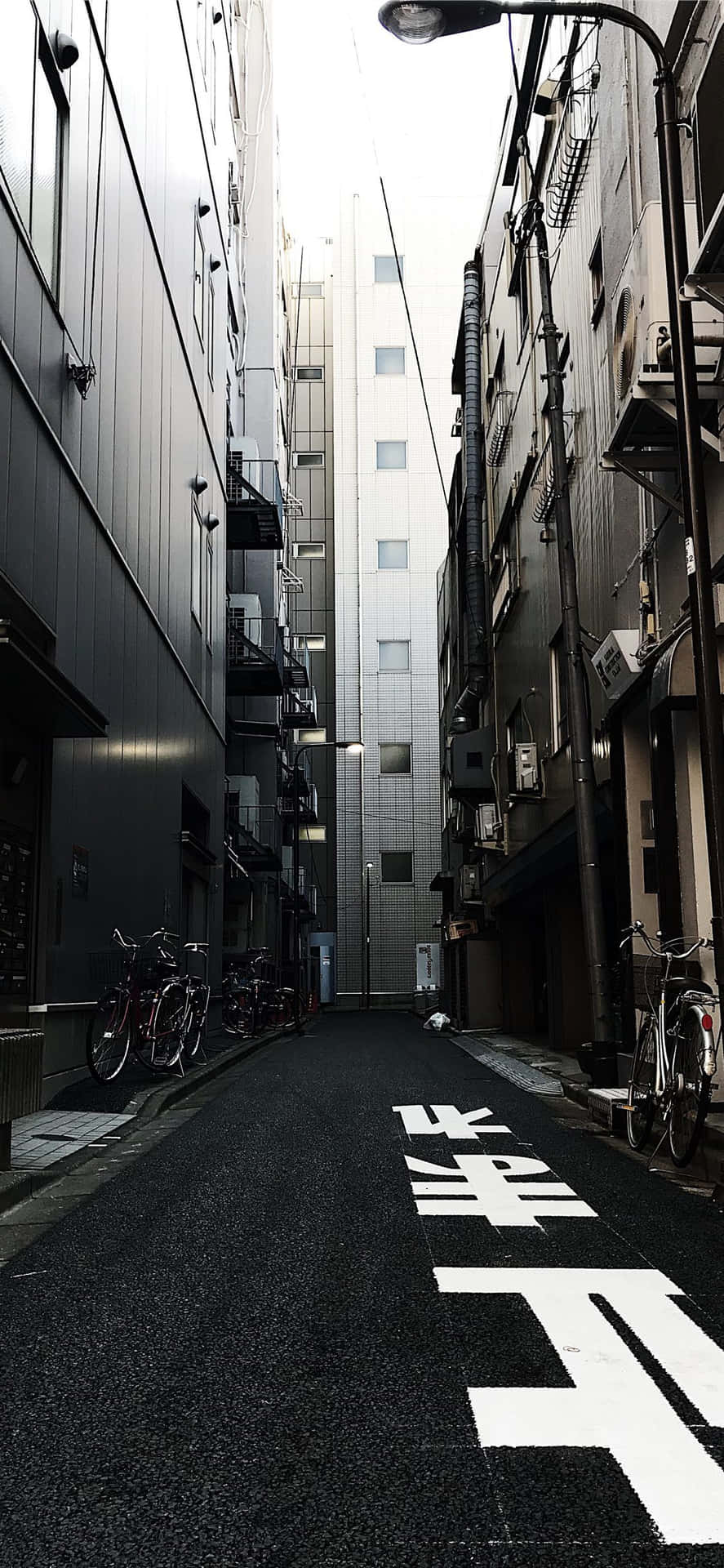 Dark Japanese Alleyway In Chiyoda Tokyo Japan Wallpaper