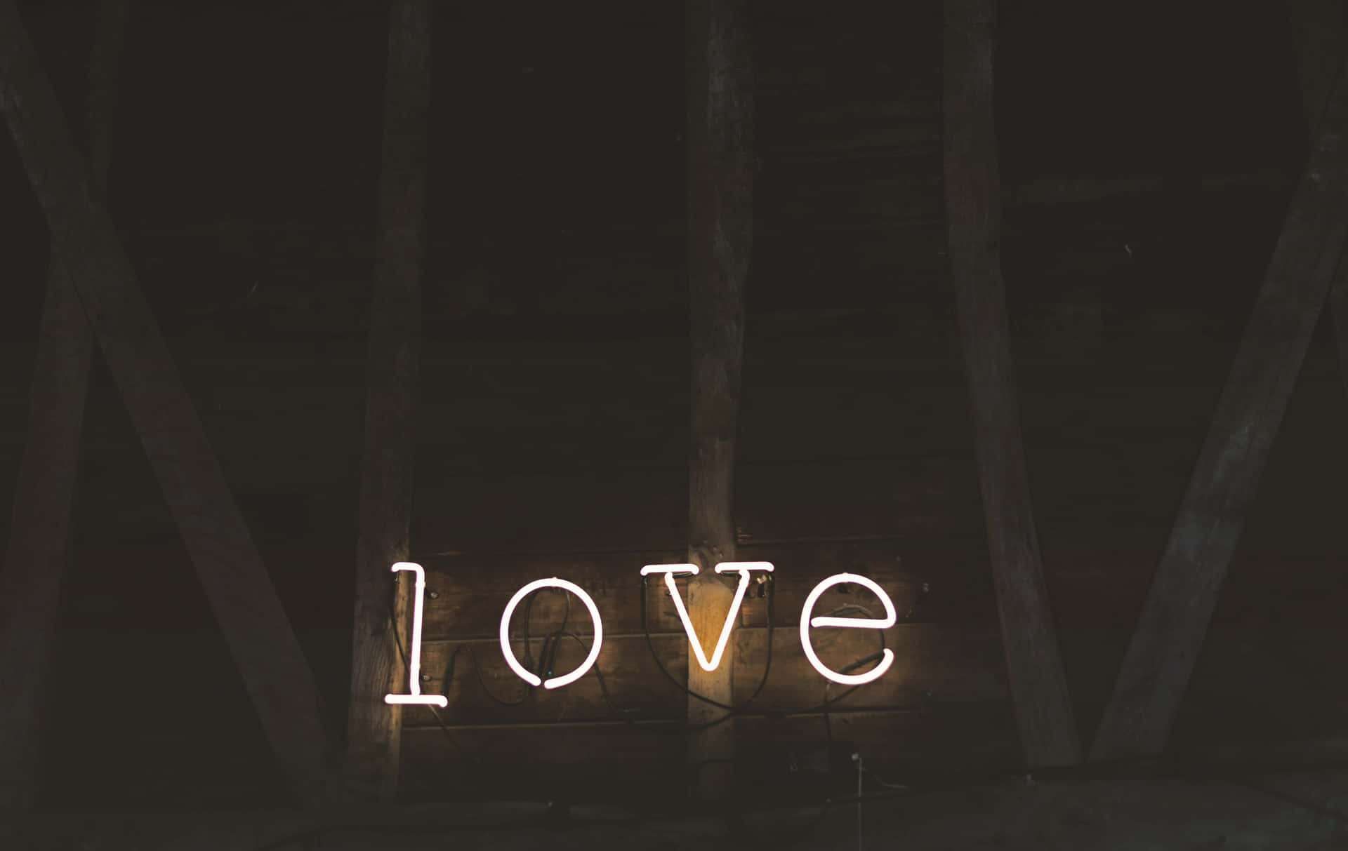 a neon sign with the word love on it