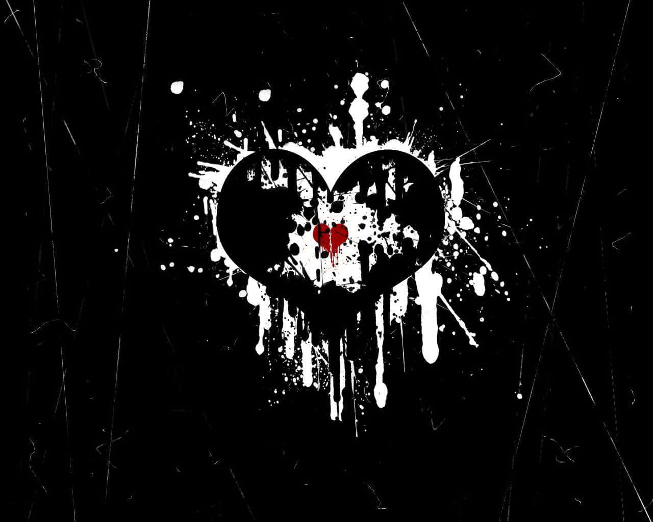 a heart with paint splatters on a black background